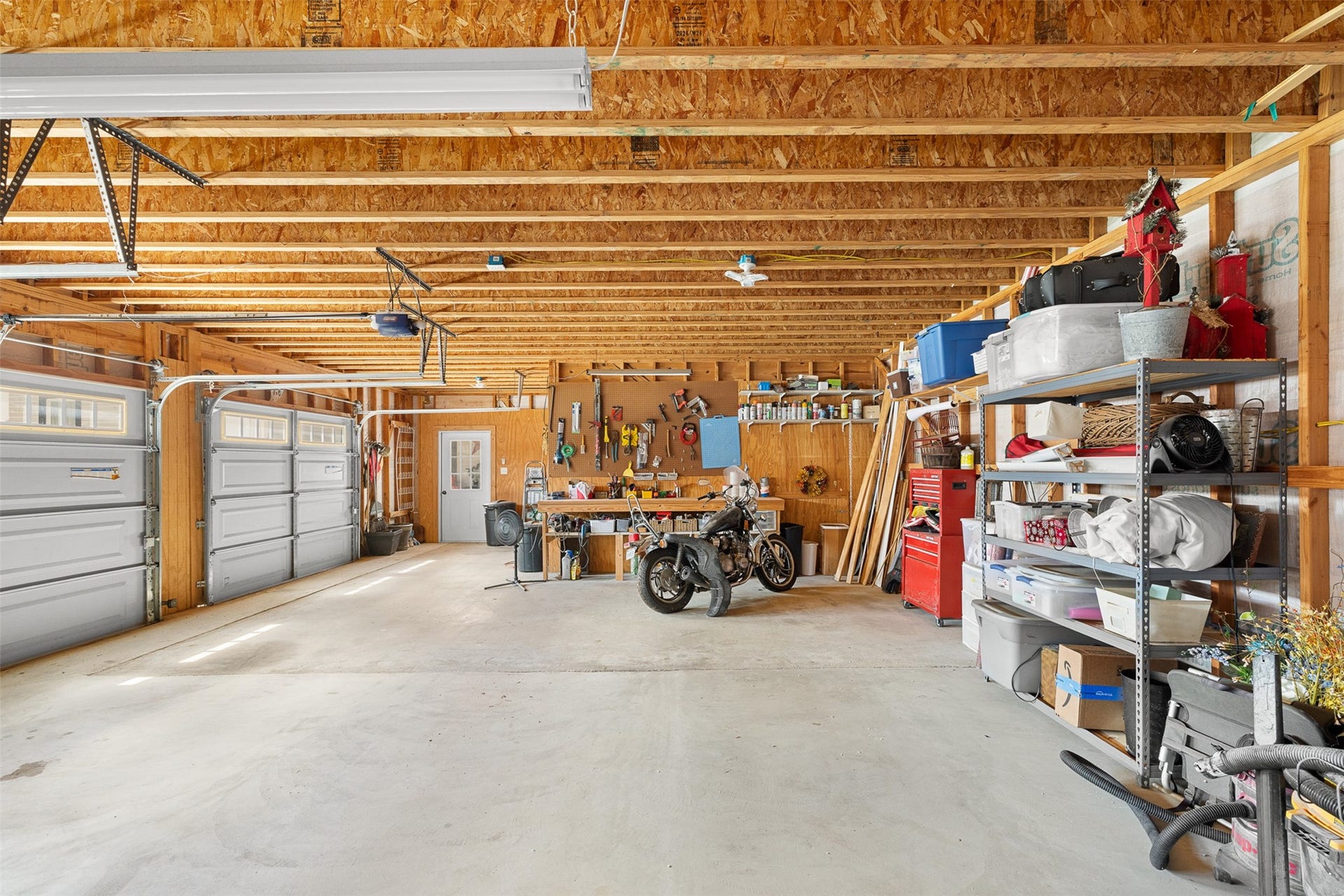 326 W Colorado Street, La Grange, TX 78945 The expansive 2.5-car garage provides exceptional space for vehicles, storage, hobbies or a workshop.