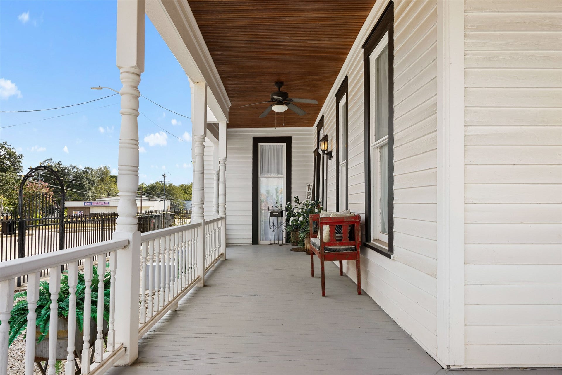 326 W Colorado Street, La Grange, TX 78945 The expansive porch offers a beautiful place to enjoy fresh air and views toward downtown La Grange.