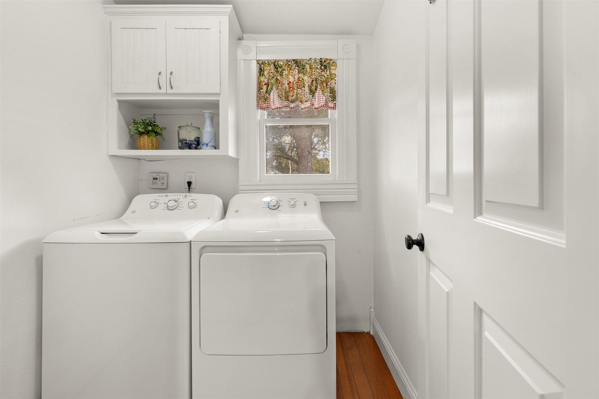 326 W Colorado Street, La Grange, TX 78945 The dedicated utility room offers built-in cabinetry and convenient in-home laundry space.