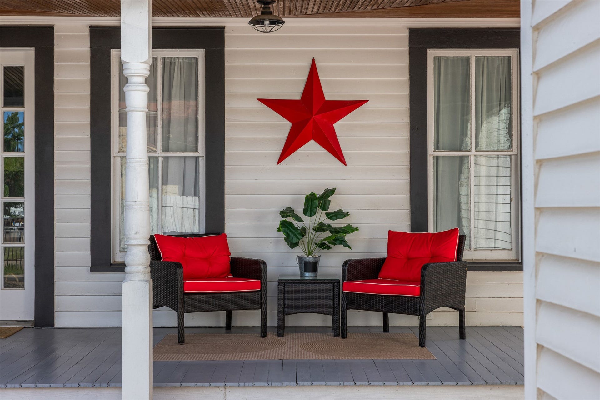 326 W Colorado Street, La Grange, TX 78945 A welcoming porch sitting area invites morning coffee, afternoon conversation and a slower pace of life.