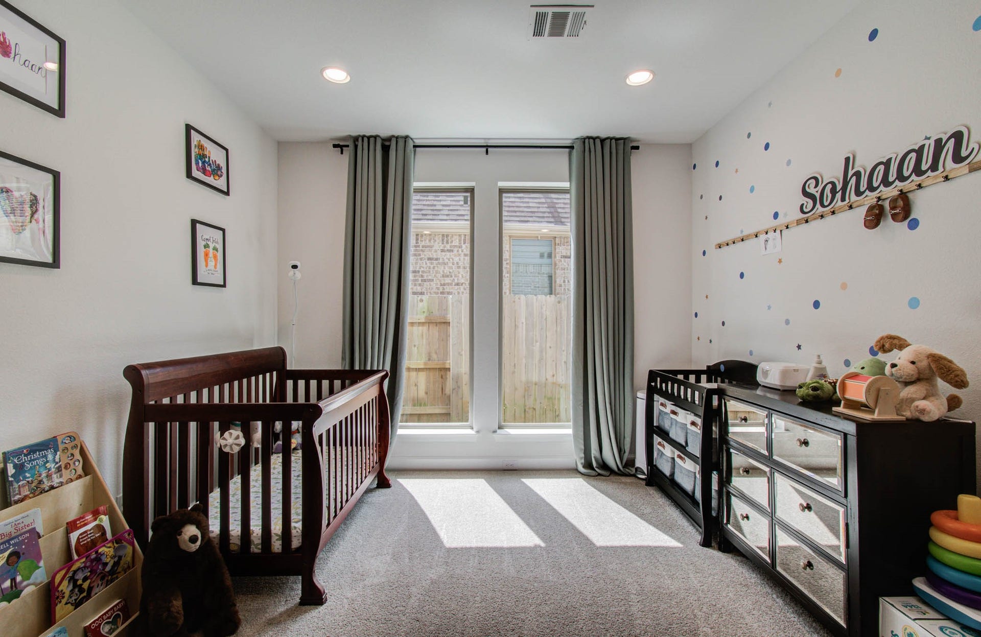 24430 Switchgrass Valley Way, Katy, TX 77493 Cozy and convenient, this versatile office area has been thoughtfully transformed into a charming infant space, perfect for easy downstairs access.