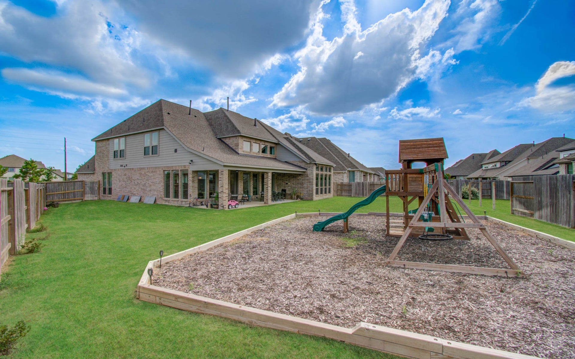 24430 Switchgrass Valley Way, Katy, TX 77493 Kids play set in backyard.