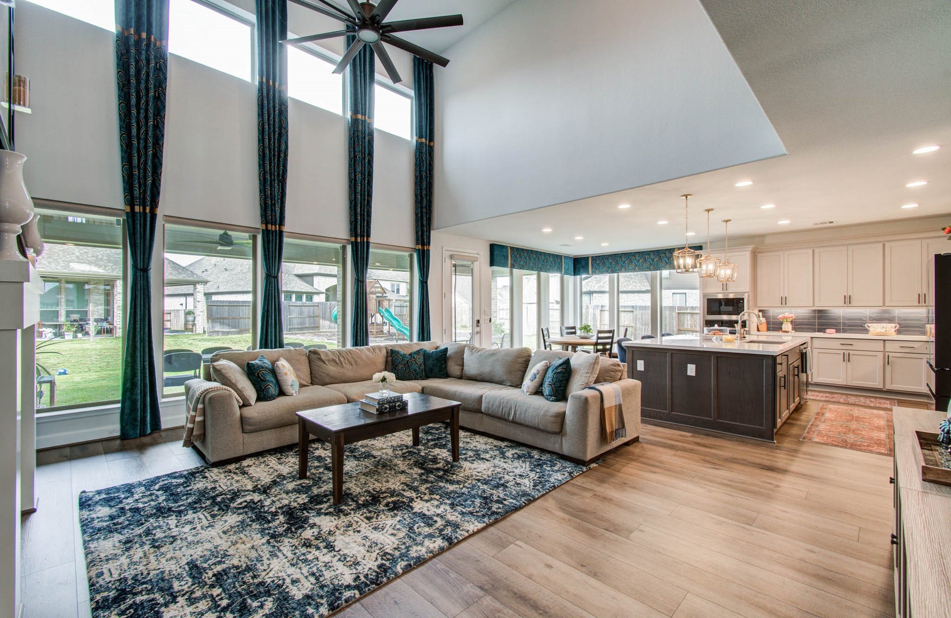 24430 Switchgrass Valley Way, Katy, TX 77493 Experience modern elegance with luxury vinyl wide planks and electric roller shades enhancing this home's sophisticated ambiance.