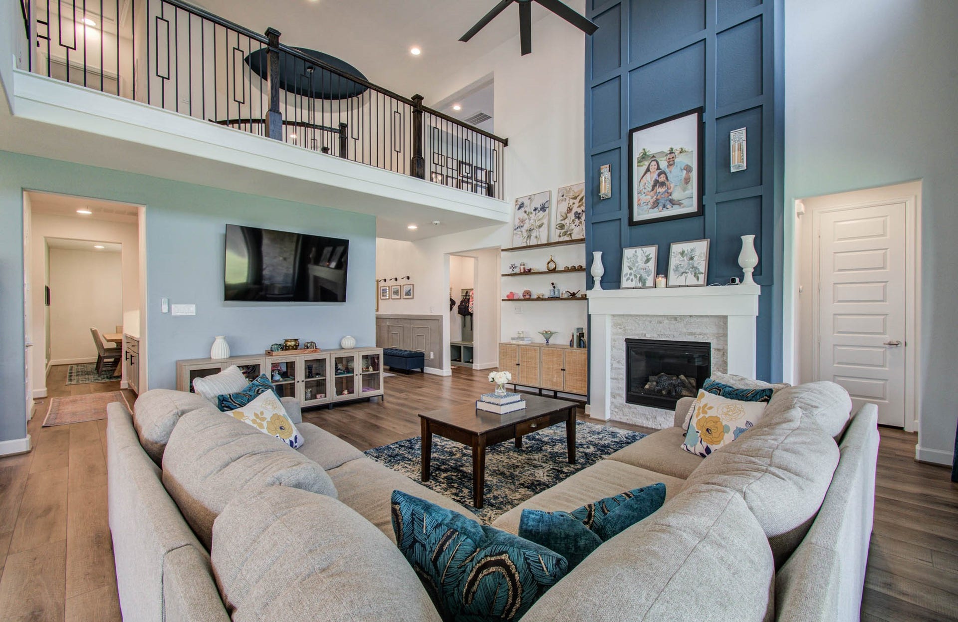 24430 Switchgrass Valley Way, Katy, TX 77493 Elevate your living experience with stunning custom wood molding that gracefully extends to the ceiling, adding a touch of elegance and sophistication to this inviting space.