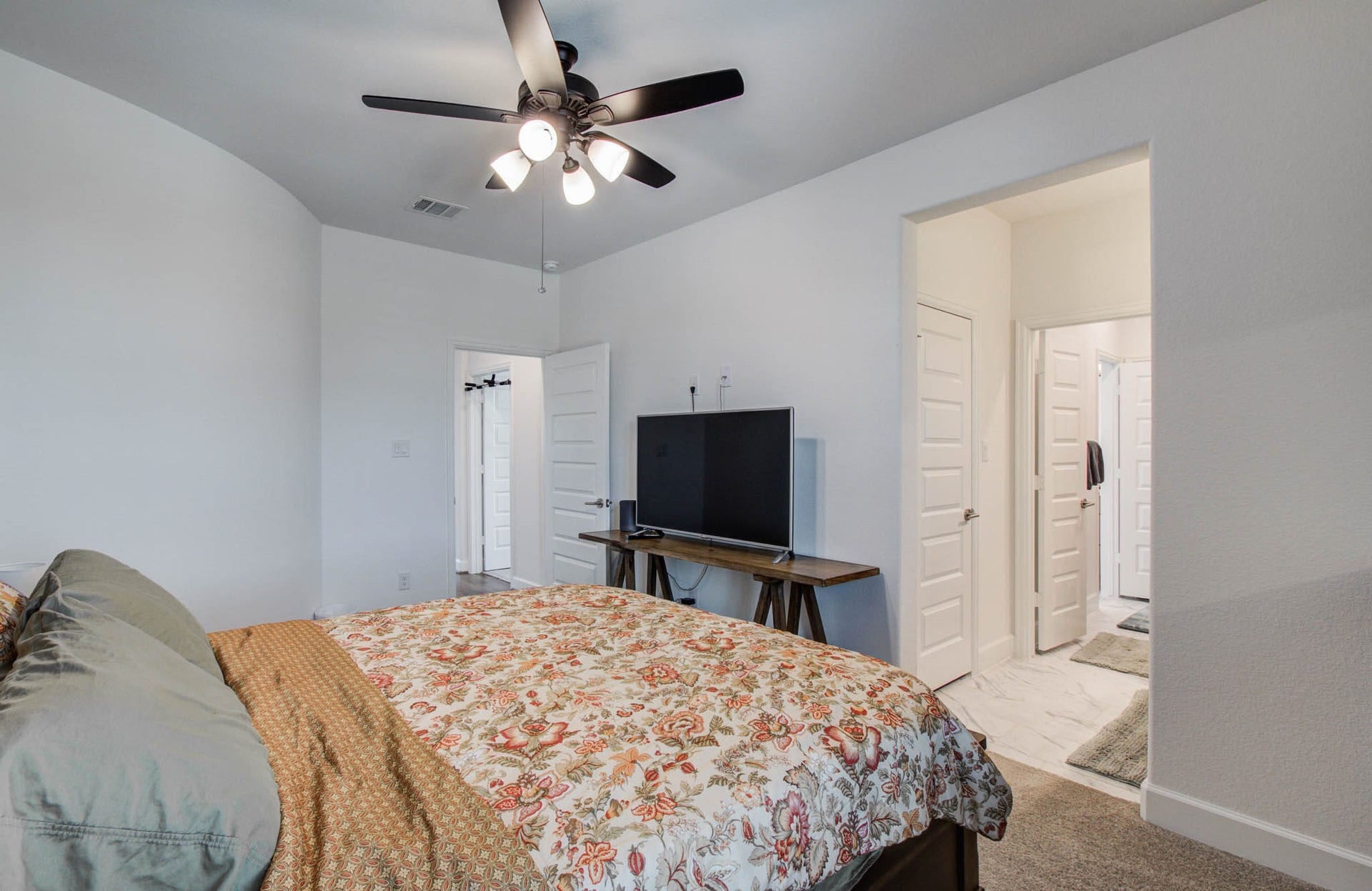 24430 Switchgrass Valley Way, Katy, TX 77493 Secondary bedroom up with ceiling fan and roller shades. This room has it own bath.