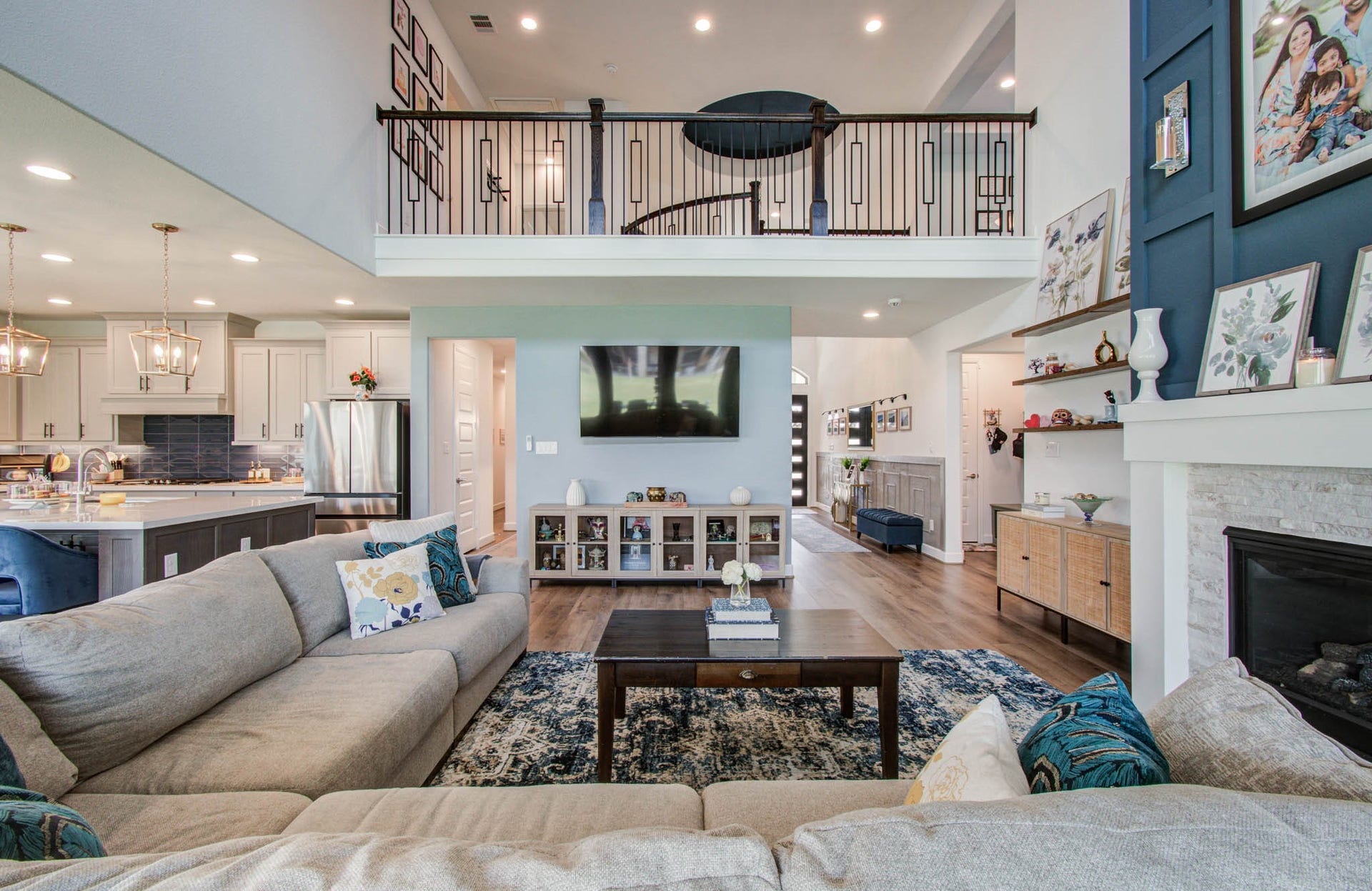 24430 Switchgrass Valley Way, Katy, TX 77493 Experience the grandeur of a two-story living room that seamlessly blends elegance and comfort, featuring a stylish open layout perfect for both relaxation and entertaining.