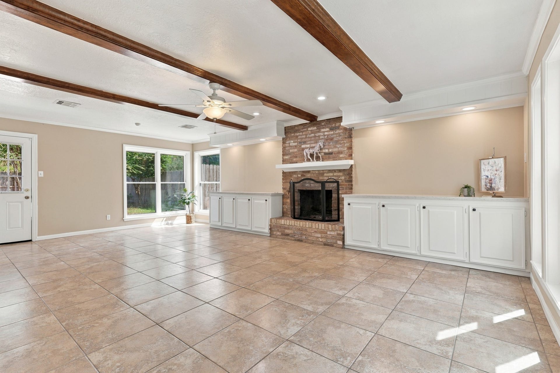 18106 Mahogany Forest Drive, Spring, TX 77379 Upon Entrance you'll walk into the Living Room with Wooden Beams across the Ceiling also including new Quartz Countertops
