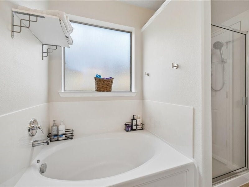 Relax with a soaking tub and separate shower.