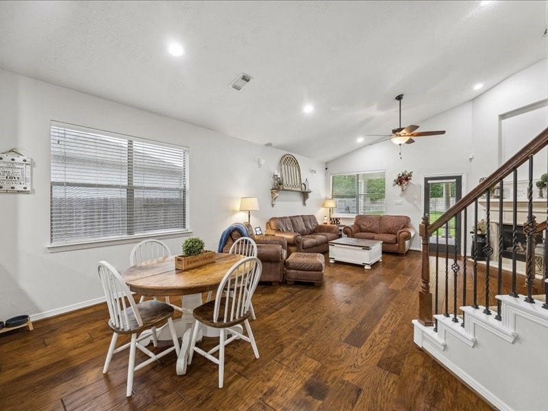 Light-filled breakfast area overlooking the living space and backyard.
