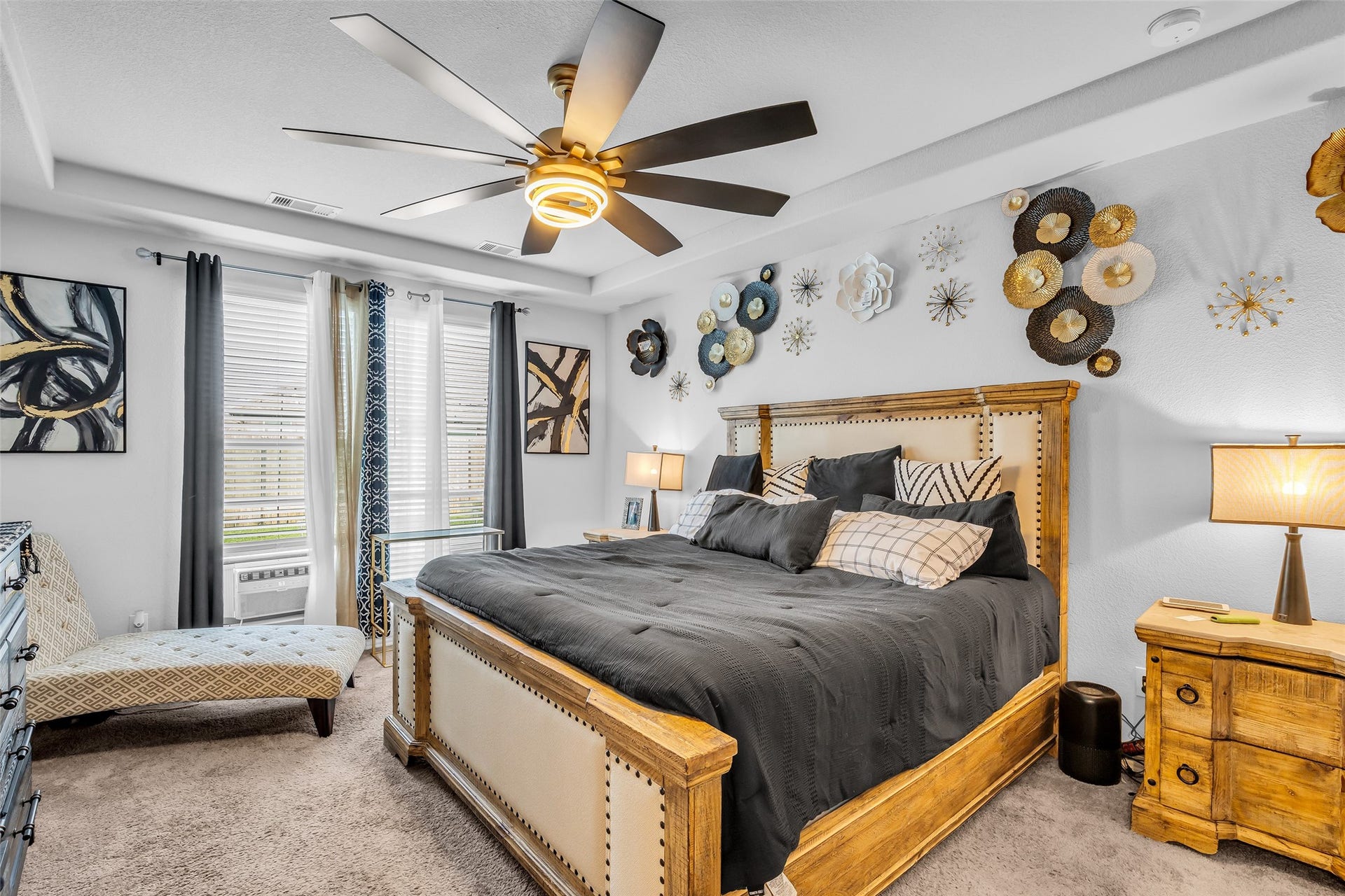 Primary suite with outside pool view.