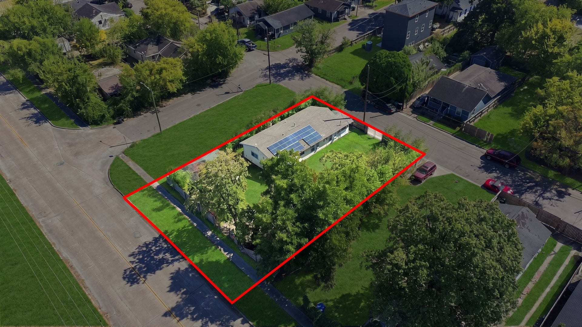 1323 E 36th Street, Houston, TX 77022 The lot features large mature trees that provide natural shade.