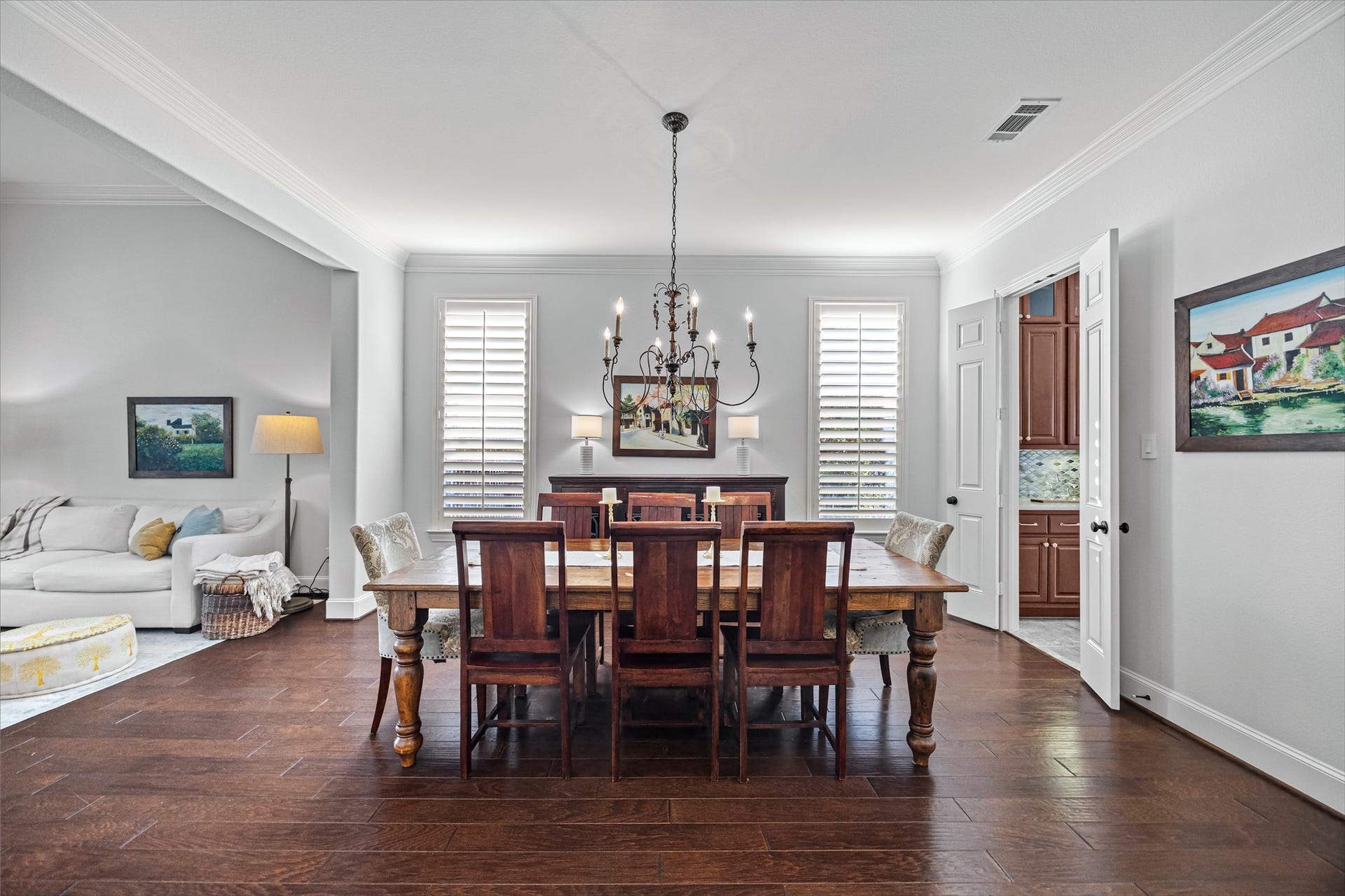 8642 Chickasaw Plum Way, Katy, TX 77494 Formal dining room flowing seamlessly into adjoining living spaces. All new lighting on dimmers. Updated paint throughout.