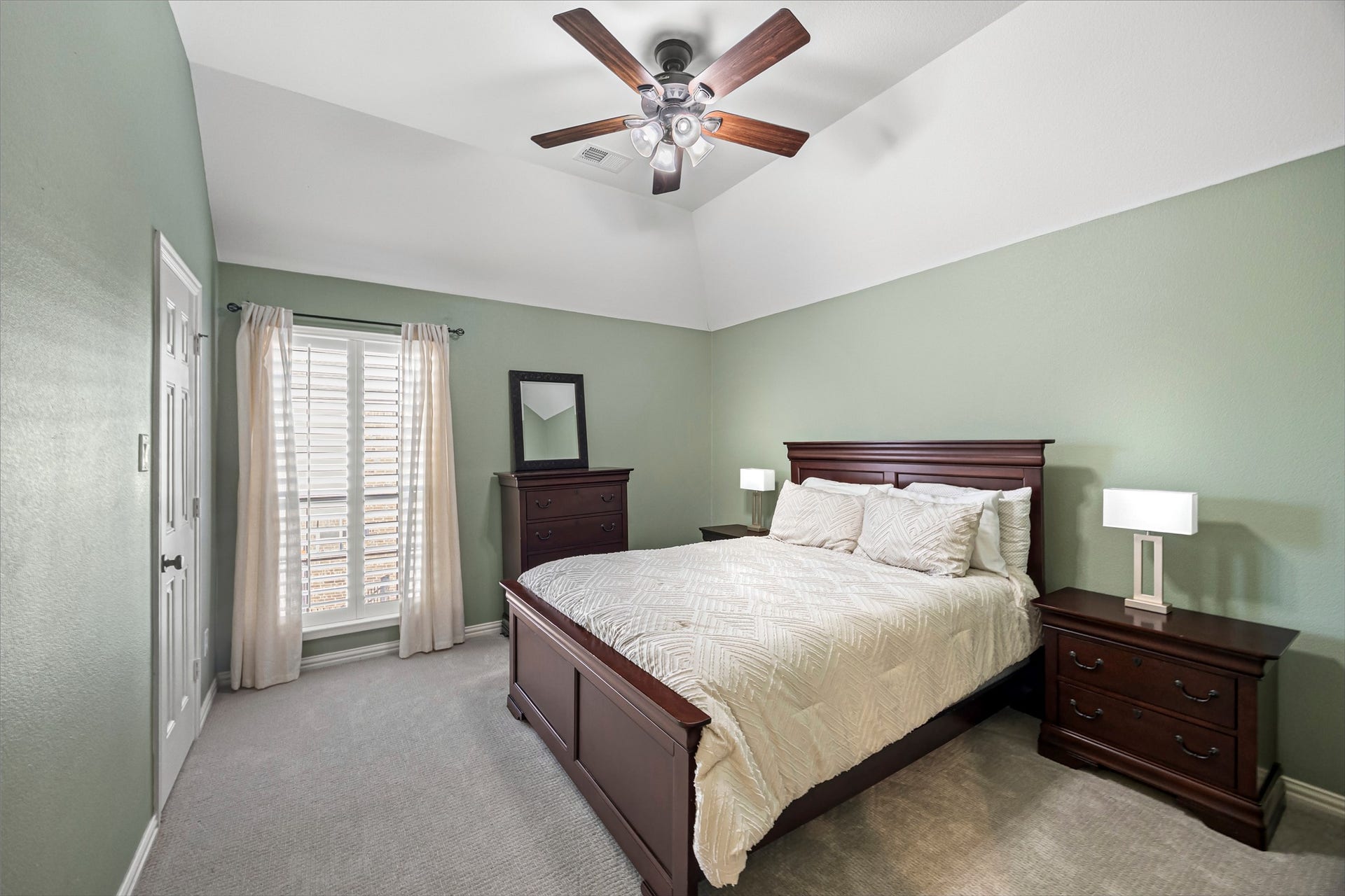 8642 Chickasaw Plum Way, Katy, TX 77494 Comfortable bedroom with ceiling fan and plush carpet.