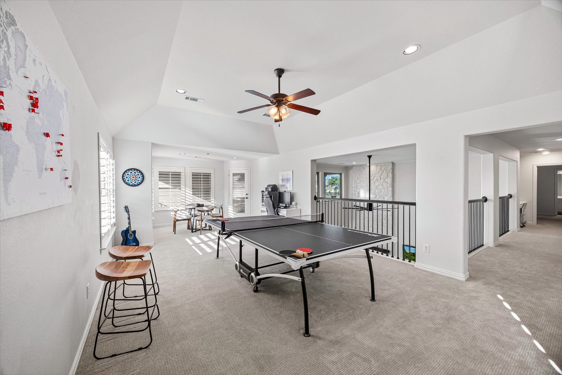8642 Chickasaw Plum Way, Katy, TX 77494 Expansive game room with ceiling fan and abundant natural light.