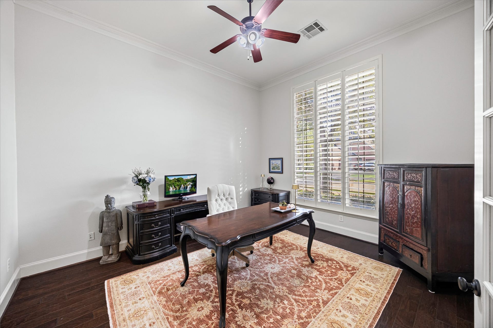 8642 Chickasaw Plum Way, Katy, TX 77494 Executive study with plantation shutters, ceiling fan, and generous natural light. New windows (2024). All new lighting on dimmers.