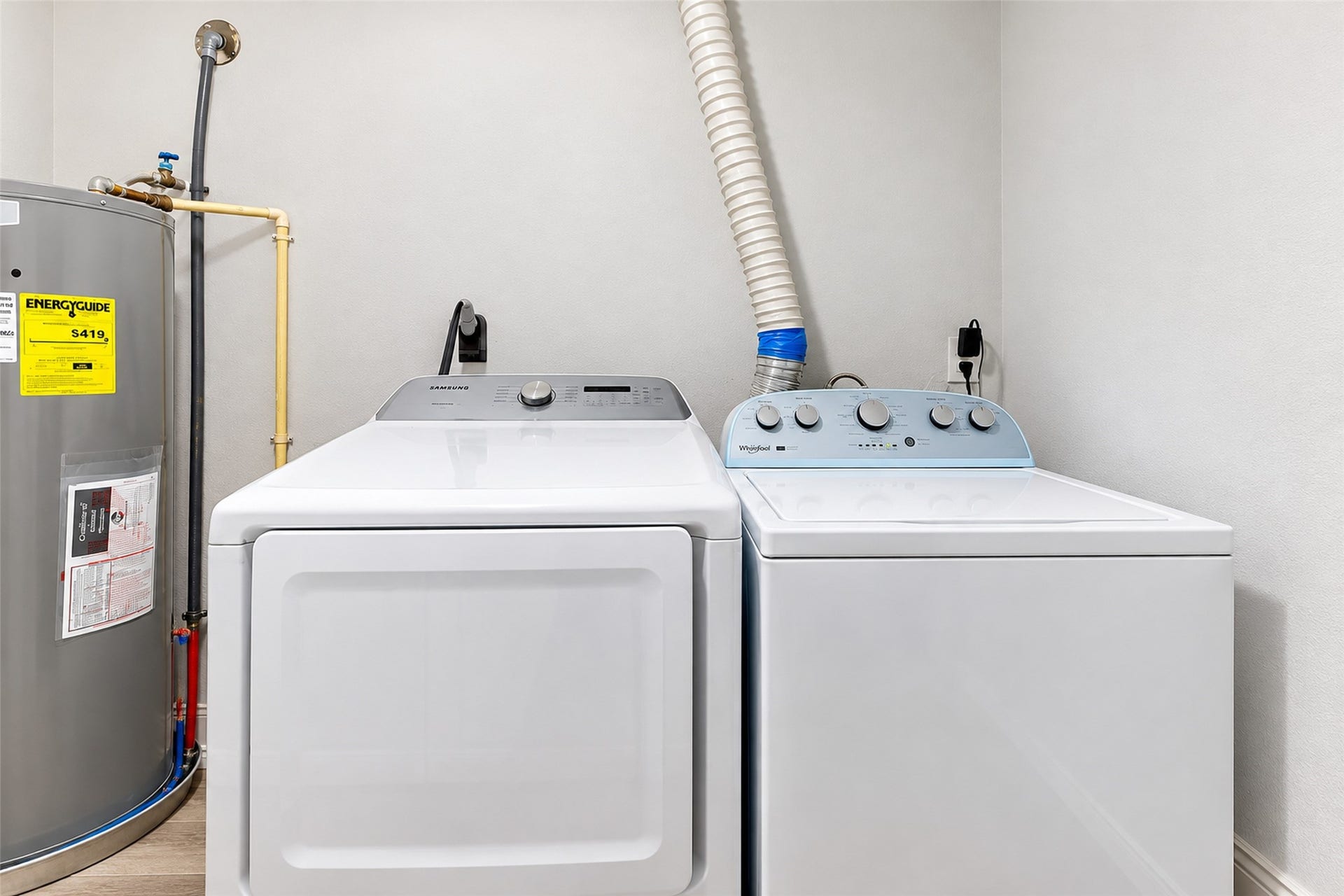 827 Dondell Street, Channelview, TX 77530 827 Dondell, Laundry room with water heater, next to it.