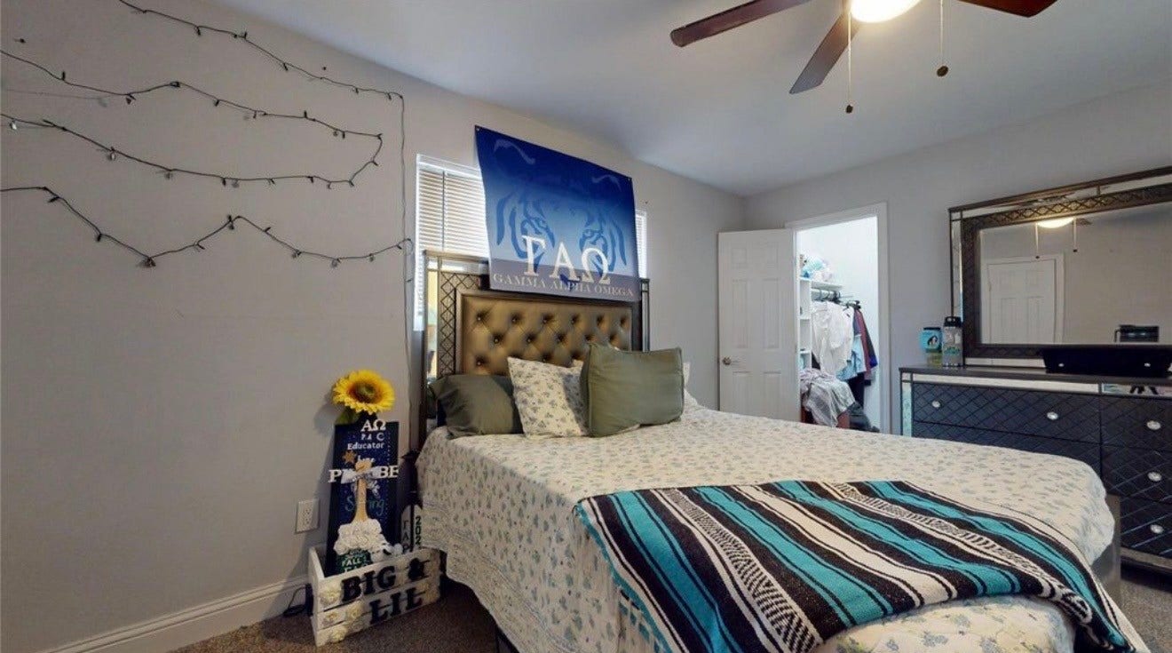 827 Dondell Street, Channelview, TX 77530 827 Dondell, 2nd Primary bedroom with it's own bathroom and walk-in closet, tan carpet and ceiling fan