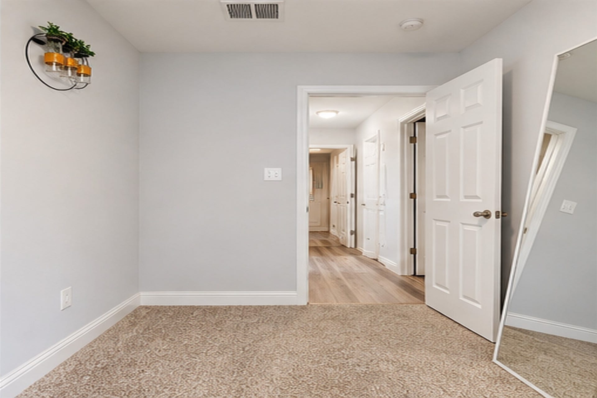827 Dondell Street, Channelview, TX 77530 27 Dondell, 5th bedroom with large window, door to hallway and tan carpet.