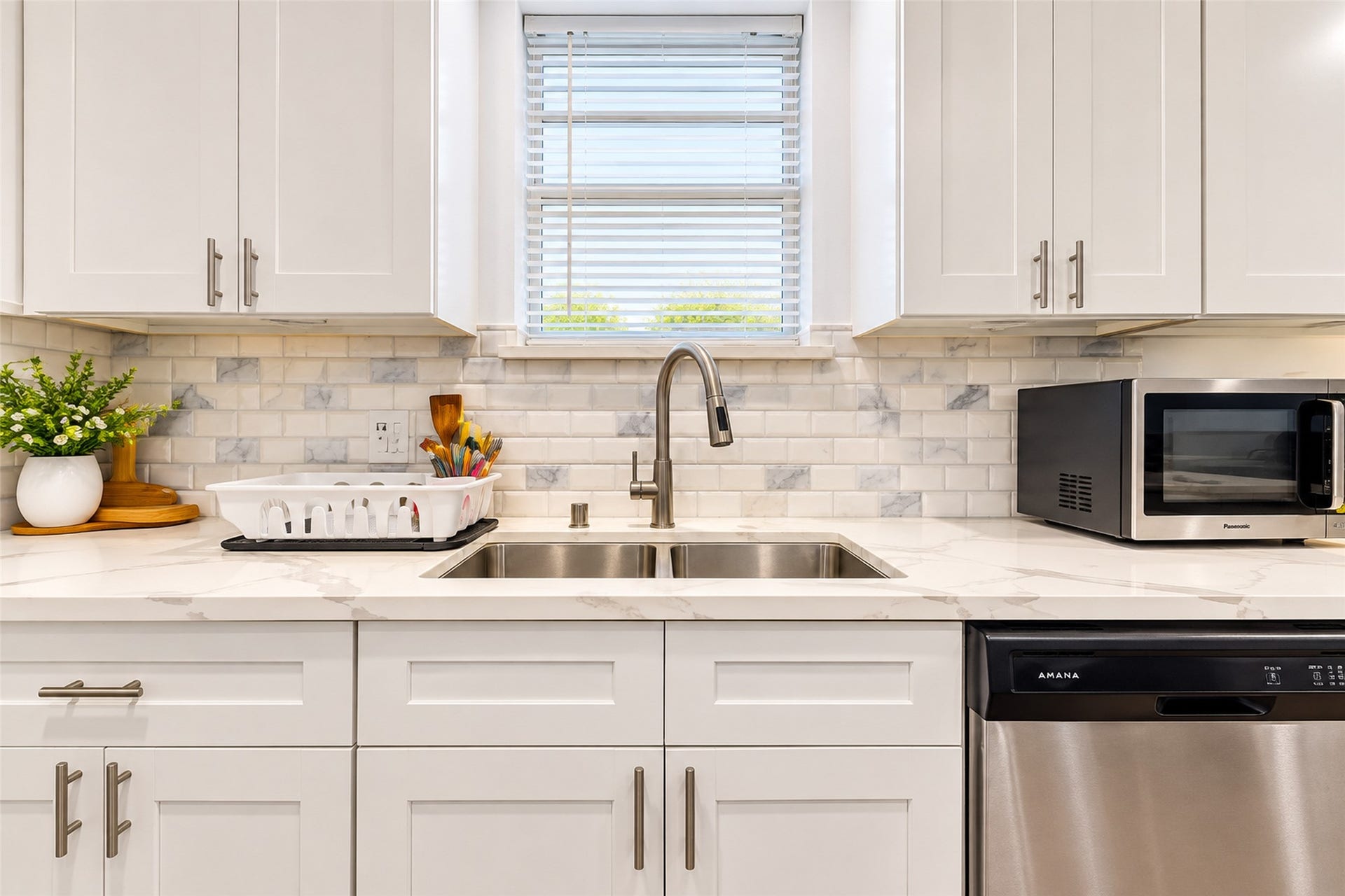 827 Dondell Street, Channelview, TX 77530 827 Dondell, Kitchen stainless steel sink and appliances, wtih subway tile and quartz countertop.