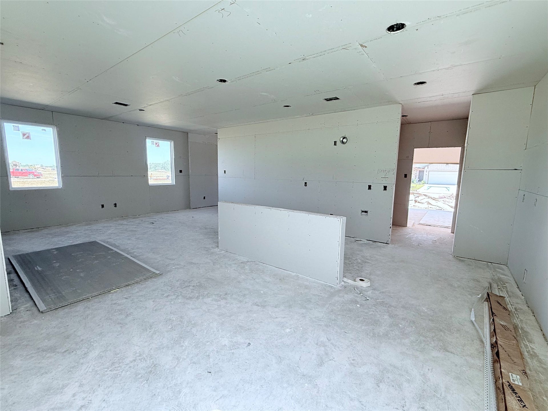 407 Hickory Hills Drive, Pattison, TX 77423 Dining room into kitchen