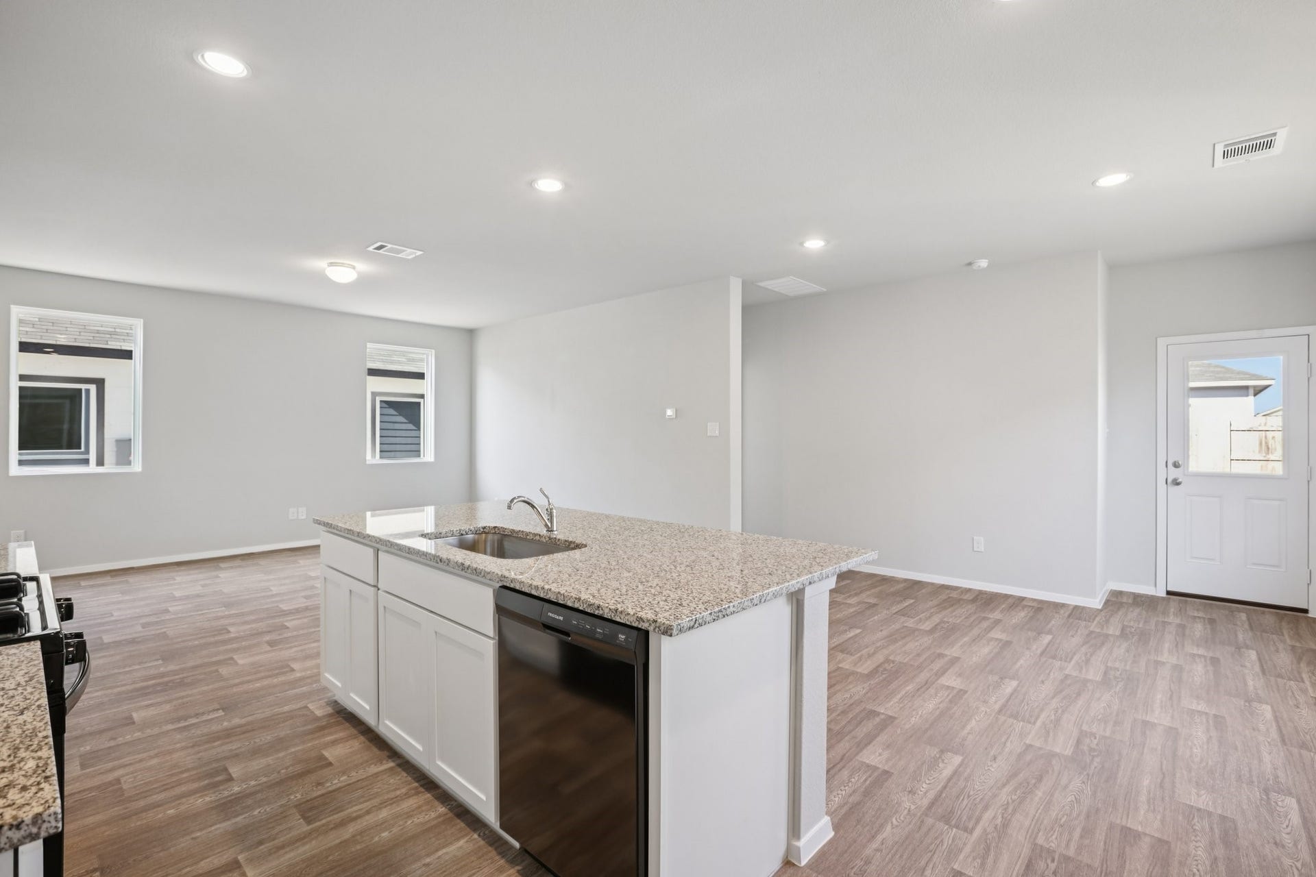 407 Hickory Hills Drive, Pattison, TX 77423 Kitchen into dining and living room representative photo