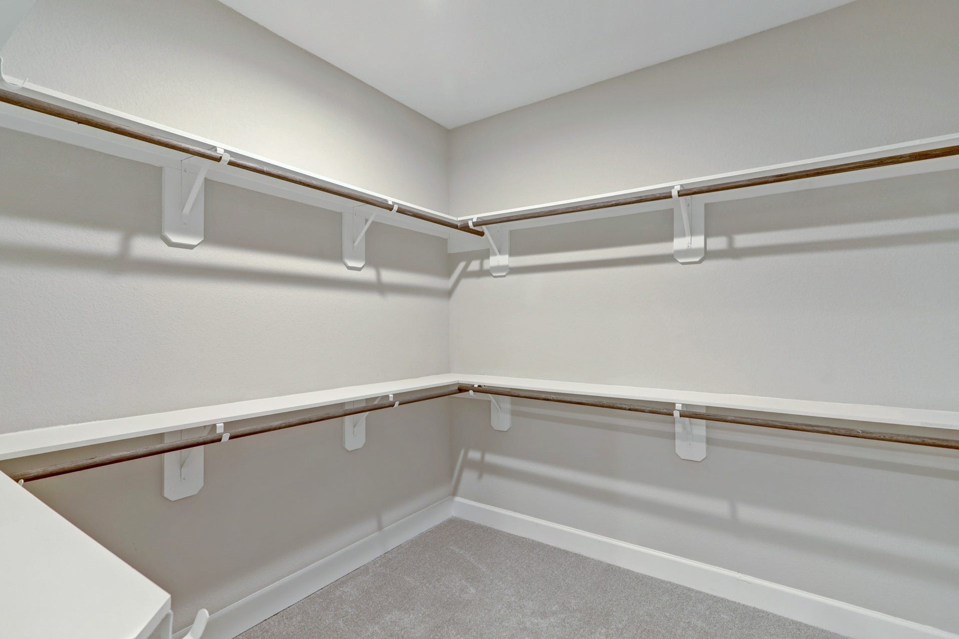 Oversized walk in closet offers ample space