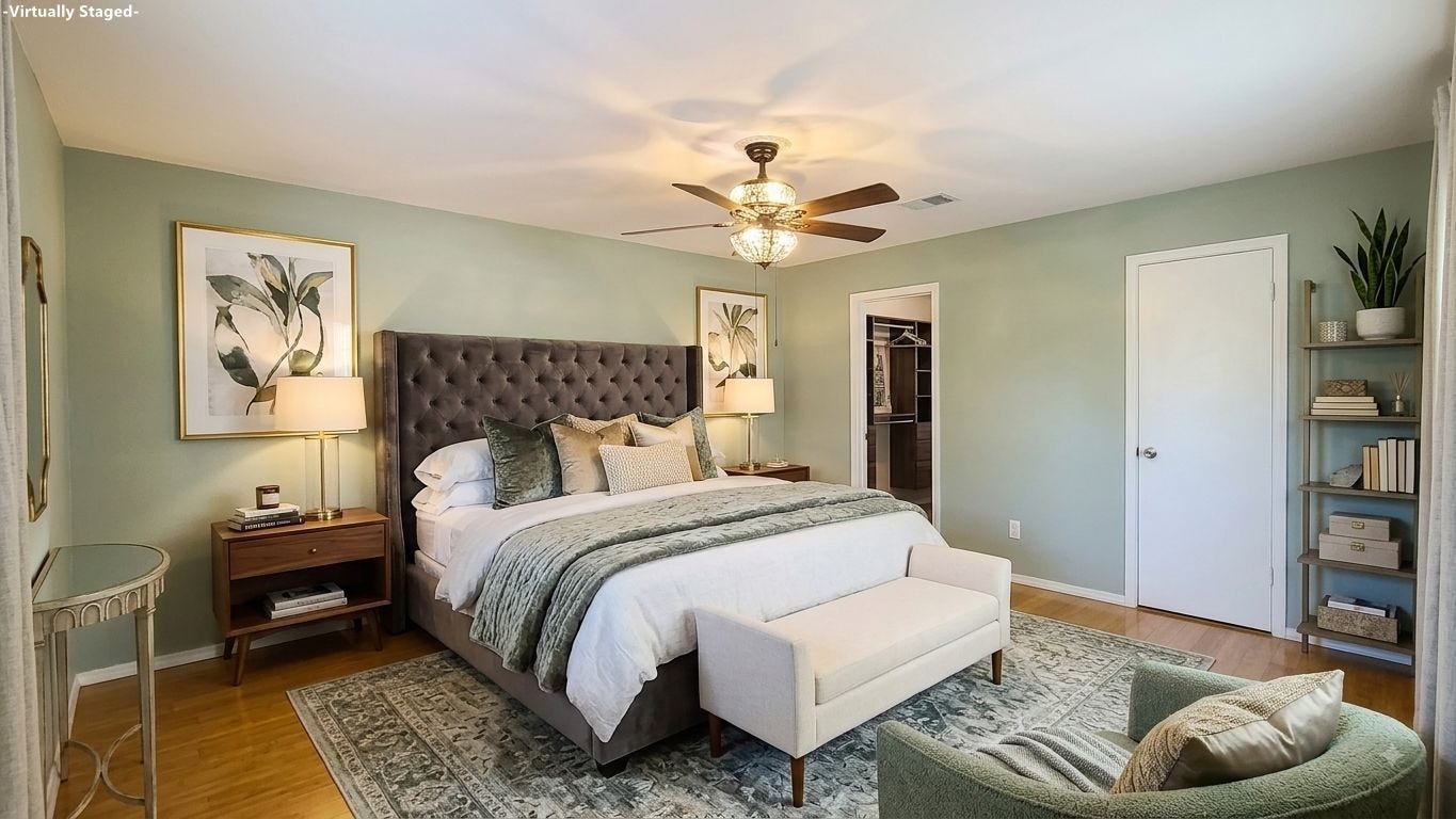 902 Ashford Parkway, Houston, TX 77077 Experience the charm of this virtually staged bedroom, featuring serene green walls and warm wooden flooring, ready to inspire your personal touch.