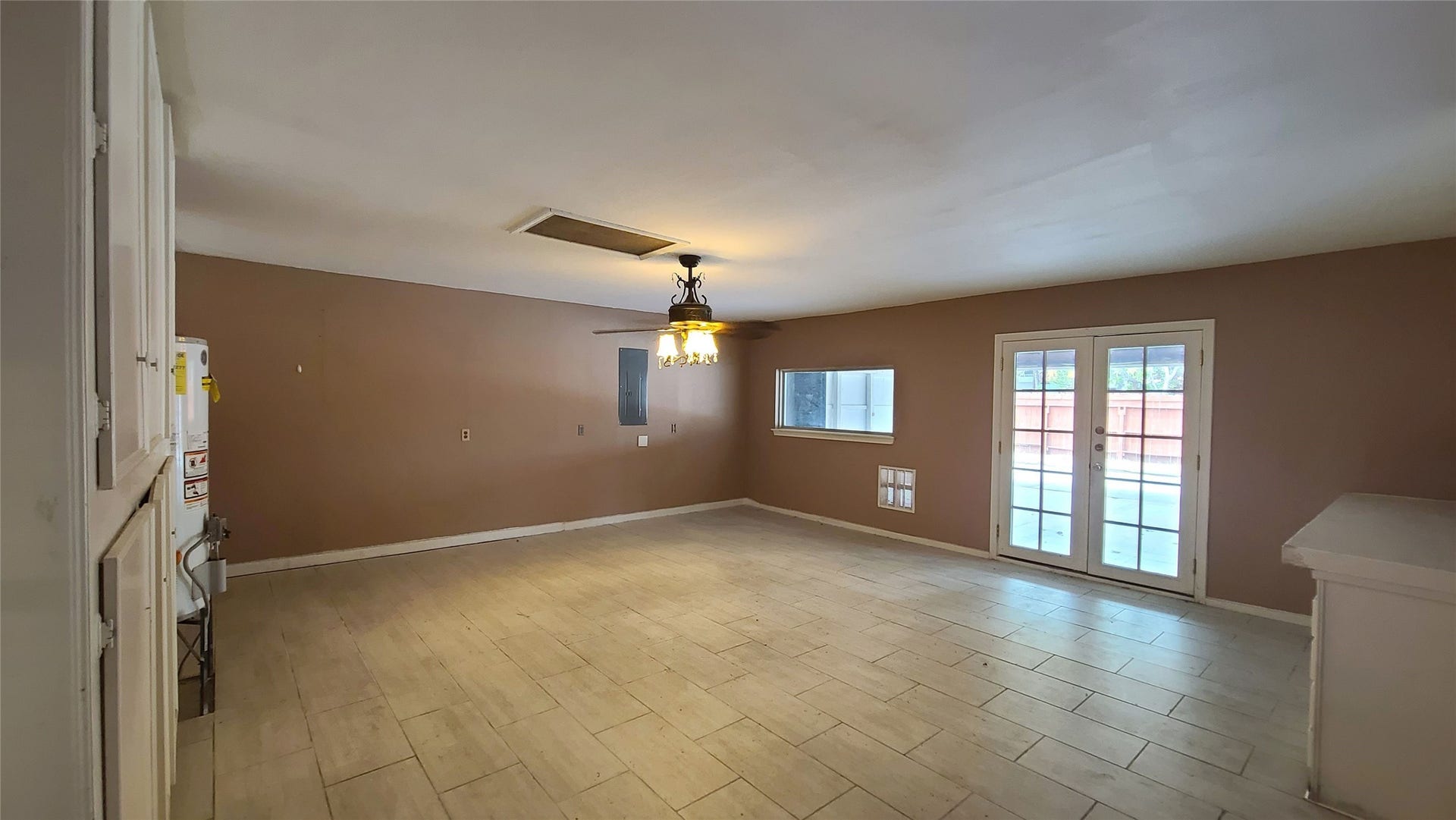 902 Ashford Parkway, Houston, TX 77077 This extra room has a double doors lead to the car port
