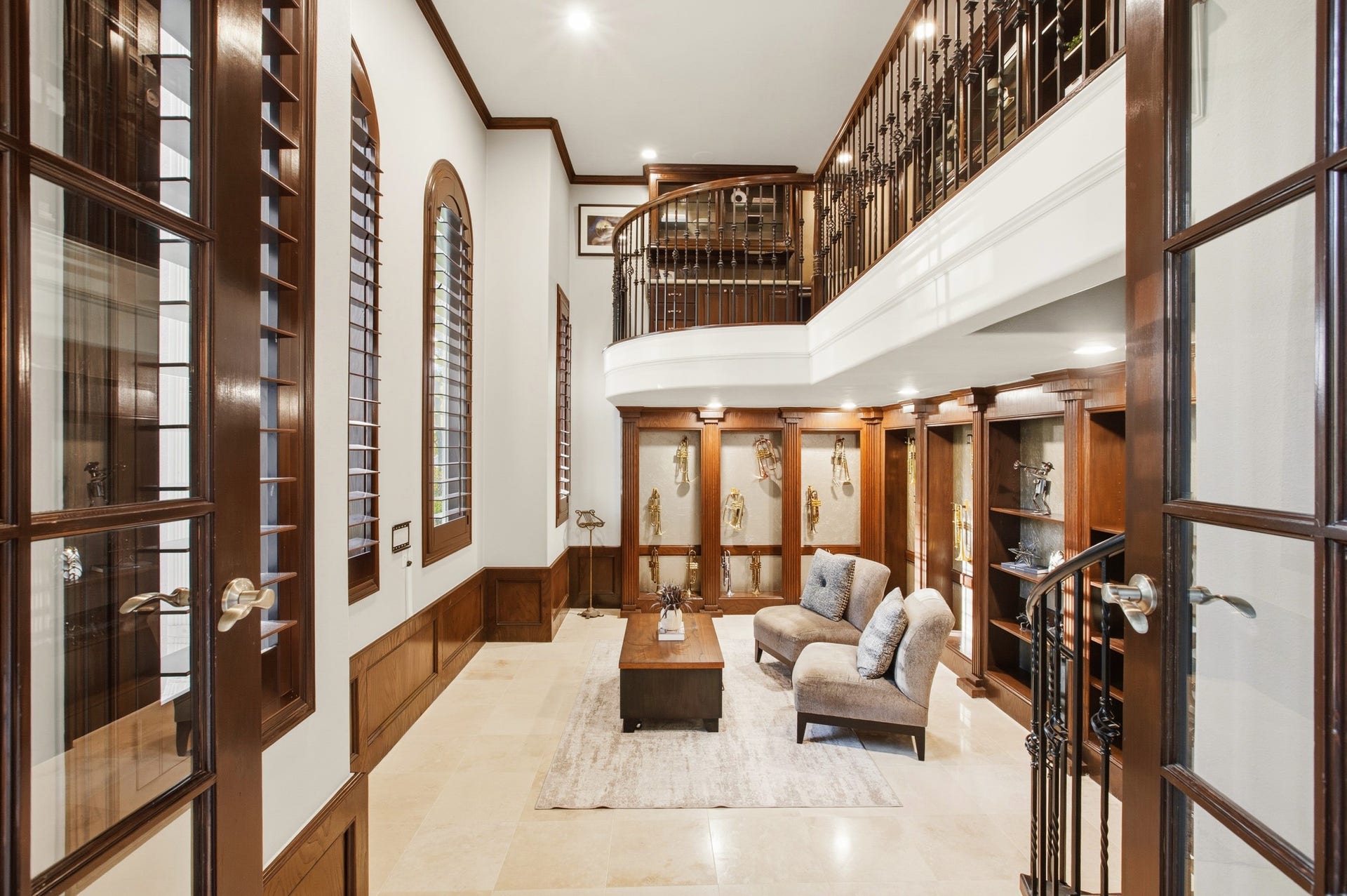 3518 River Forest Drive, Richmond, TX 77406 Experience elegance in this stunning two-story study, featuring rich wooden accents and abundant natural light for a perfect blend of sophistication and comfort.