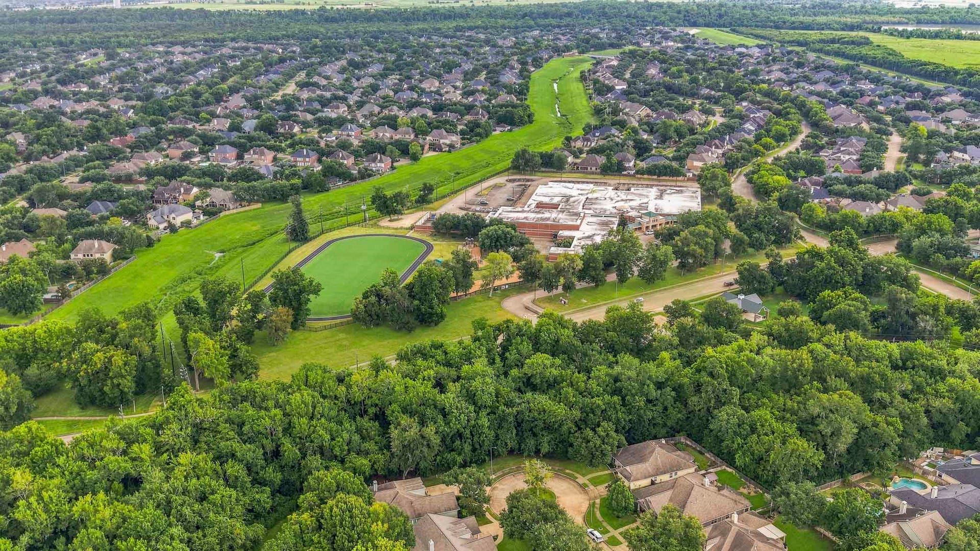 Nestled in a lush, green landscape, this wonderful neighborhood offers a harmonious blend of suburban homes and natural beauty, featuring LCISD's top rated schools!