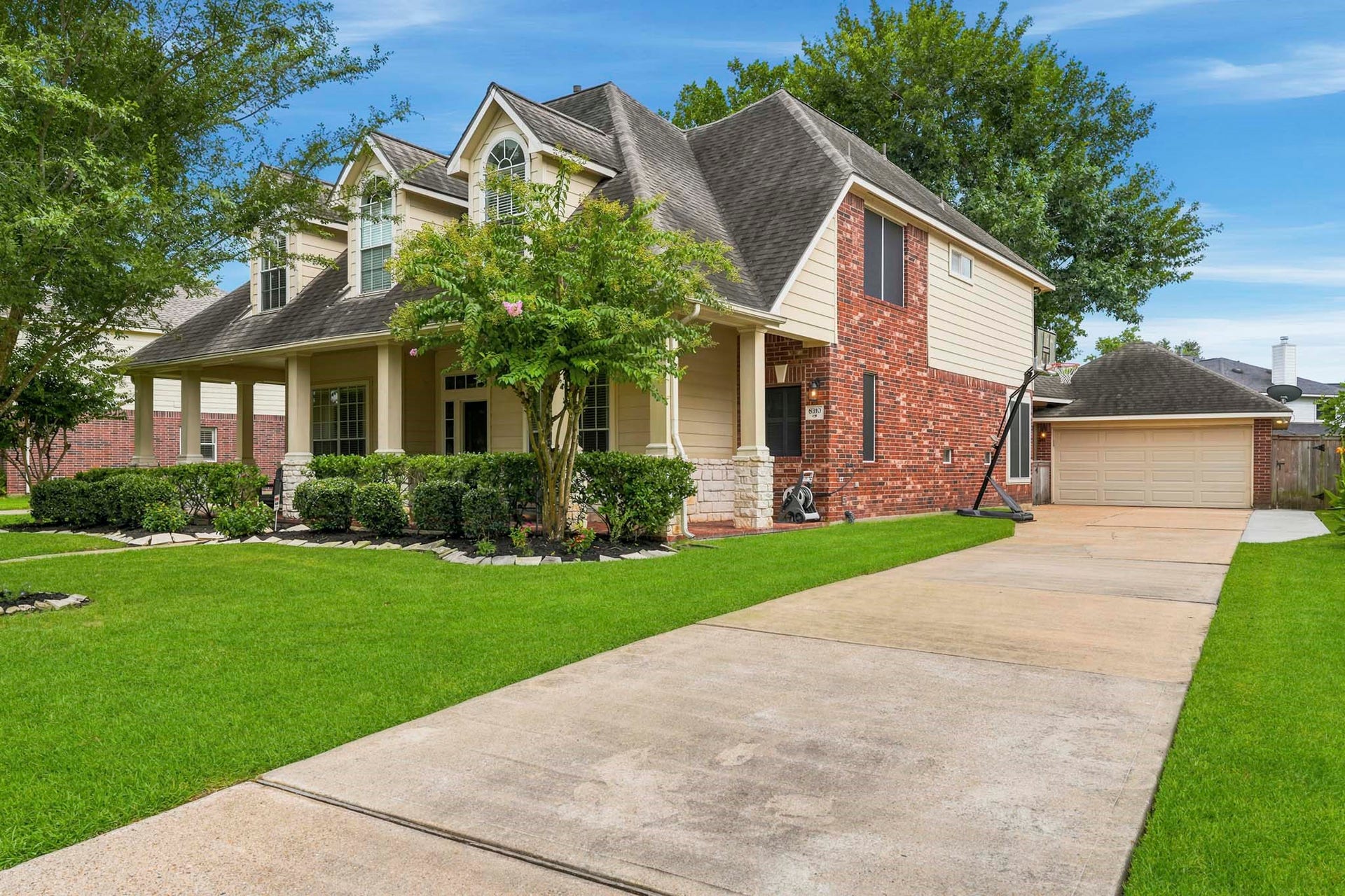 Widened driveway allows for side by side parking. The owners have thought of everything!