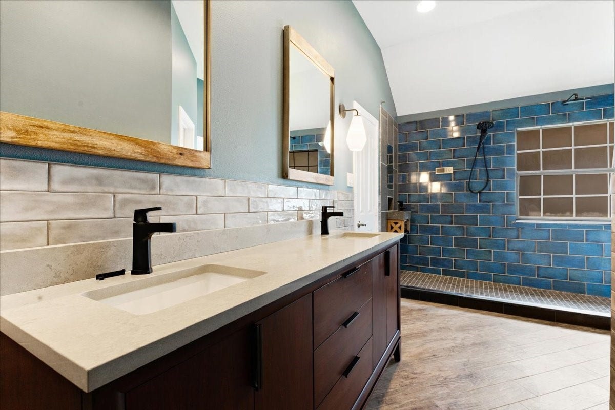 A heated bathroom floor brings extra comfort to your morning routine. A double-sink vanity, generous storage and a spacious walk-in shower make the primary bathroom a retreat you can appreciate every day.