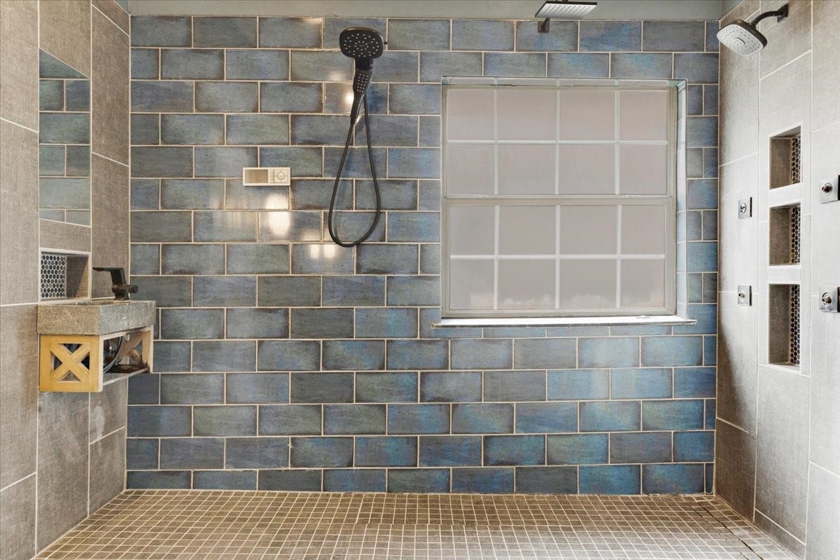 Bring a little luxury to the daily routine. The primary suites smart shower, multiple shower fixtures and generous walk-in space offer a more personalized experience, with convenient storage for essentials.