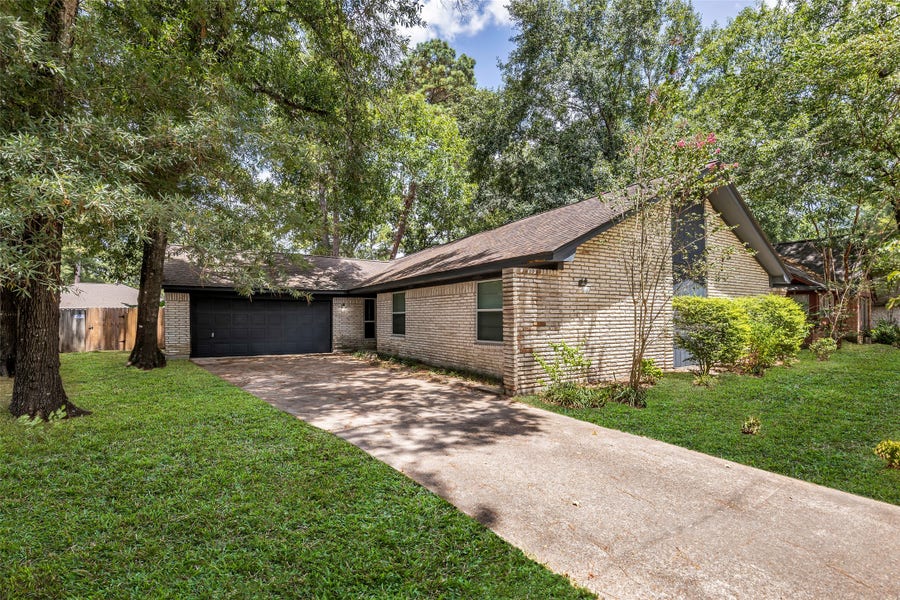 Property photo for 2023 Shadow Rock Drive, Kingwood, TX
