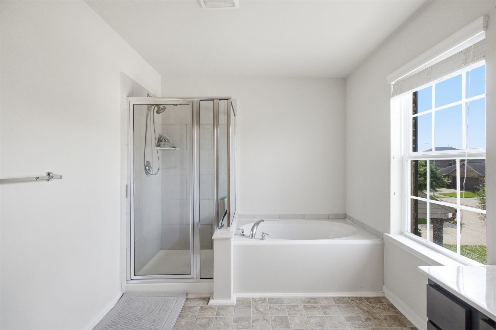 11315 Rossum Creek Drive, Humble, TX 77396 Primary bathroom with separate tub and shower