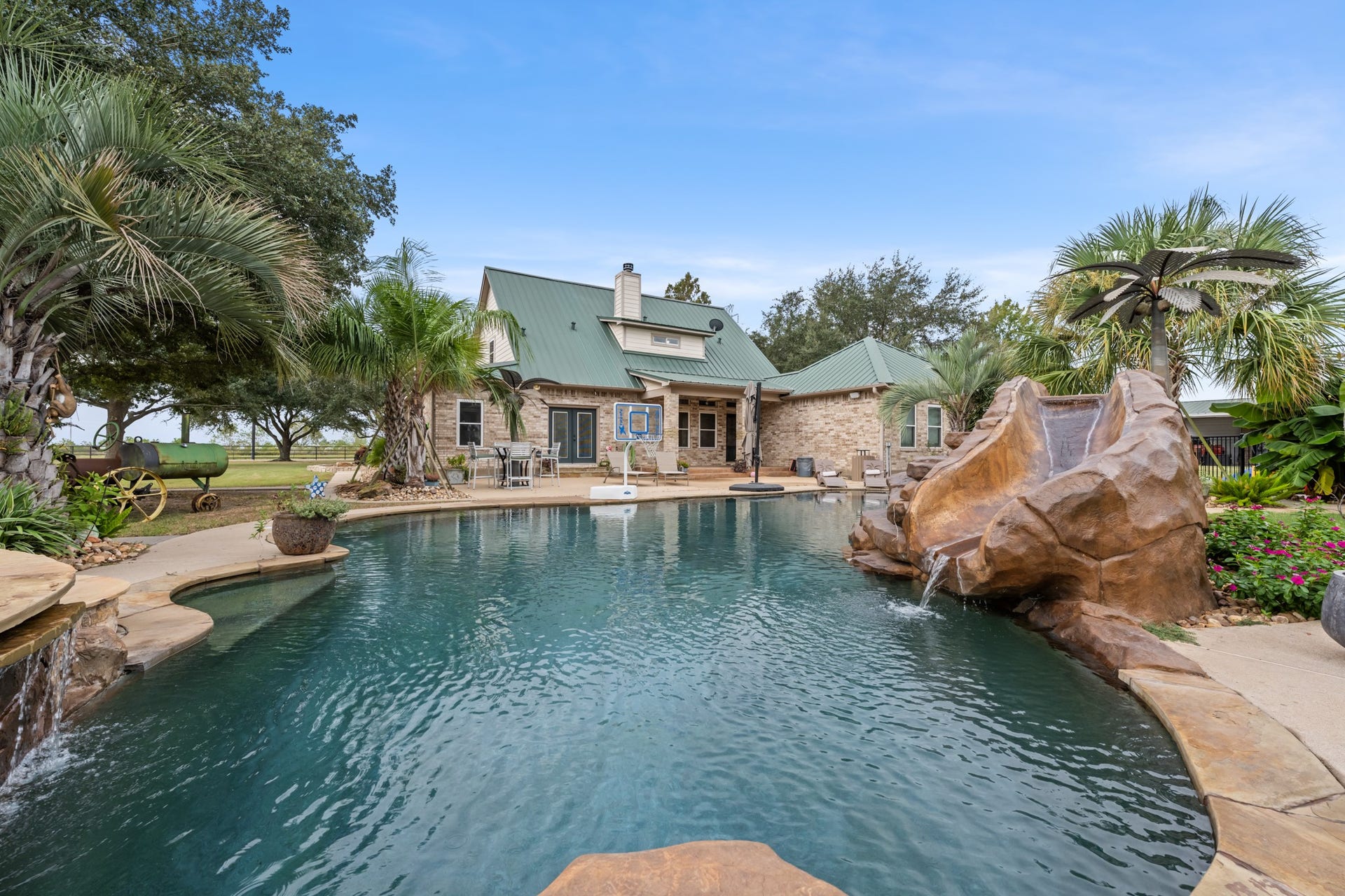 28030 Betka Road, Hockley, TX 77447 custom pool water features and water slide