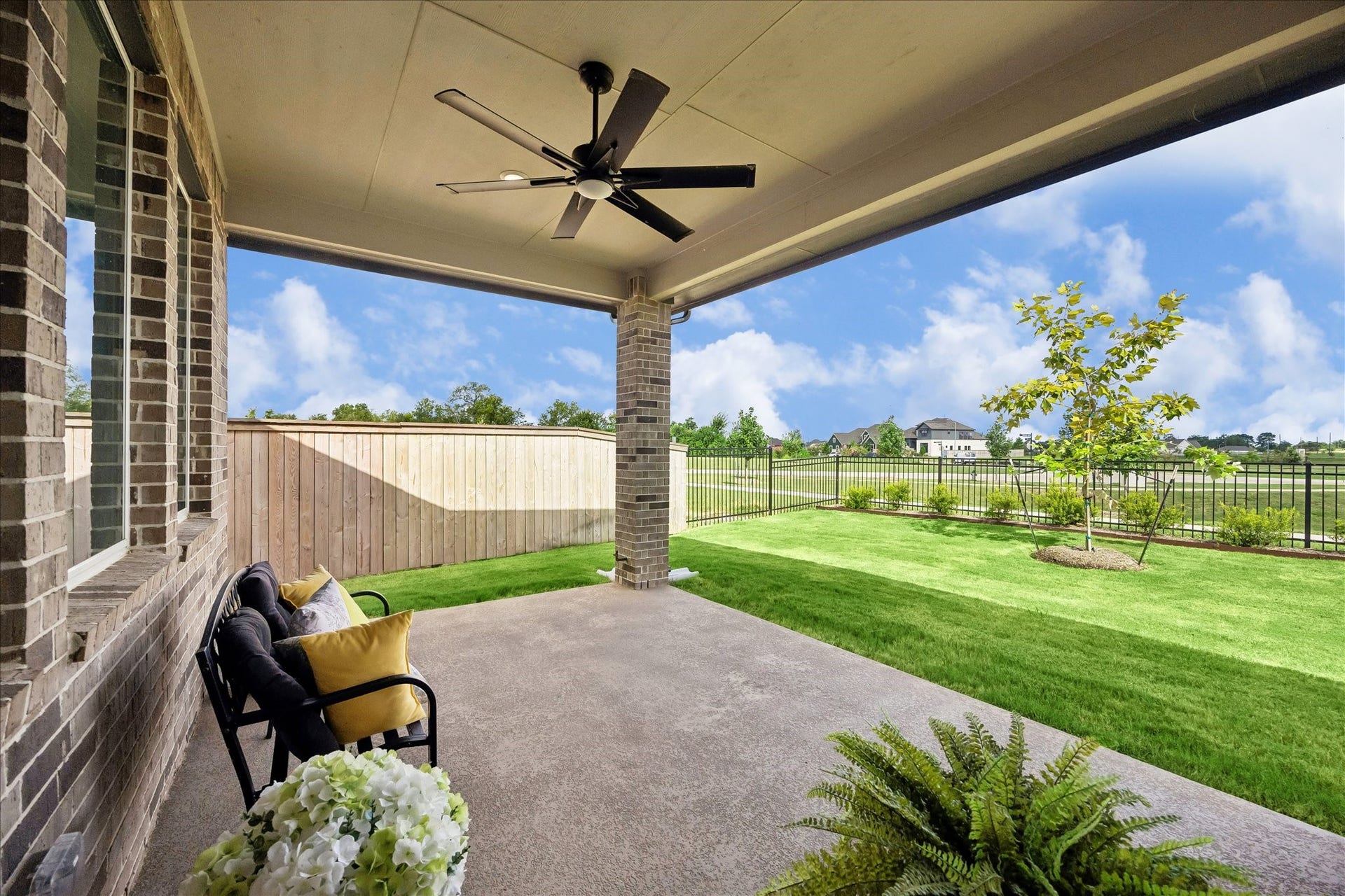 32438 Violet Dancer Court, Fulshear, TX 77441 Another view of the patio and backyard from the back door.