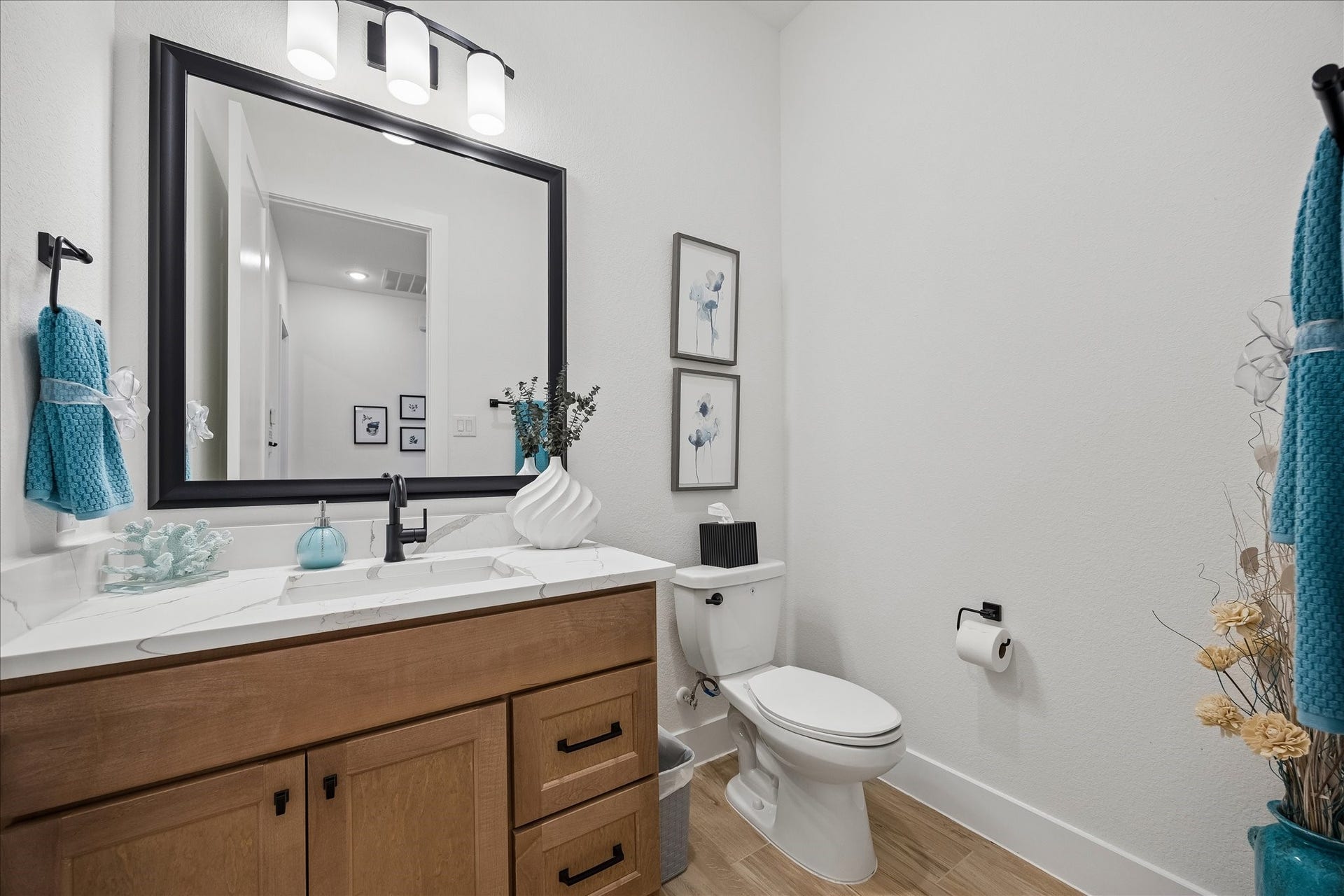 32438 Violet Dancer Court, Fulshear, TX 77441 Full view of powder bathroom with custom soft close cabinets and granite countertops.