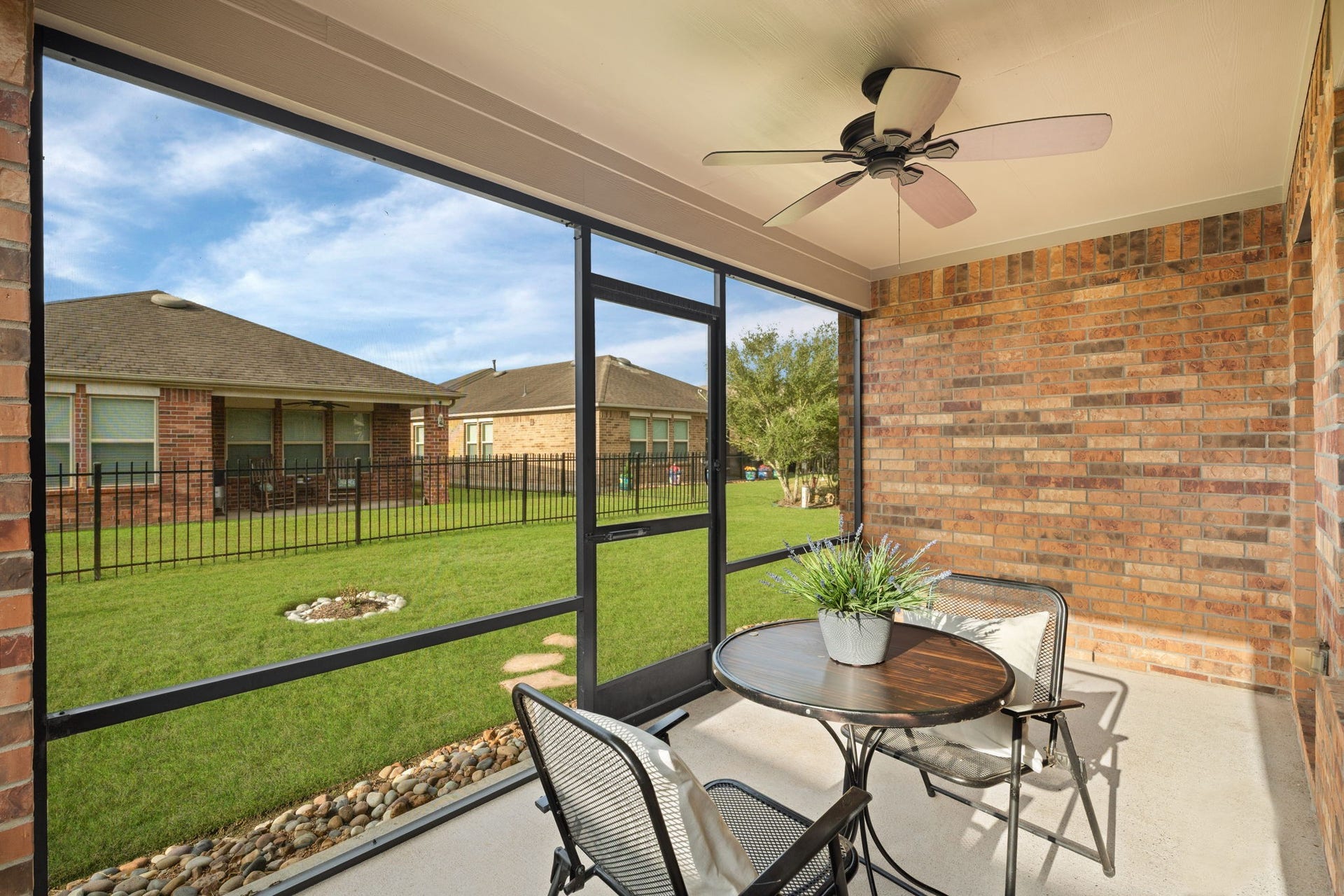 2938 Cone Flower Drive, Richmond, TX 77469 Screened-in patio invites you to relax & enjoy fresh air without pesky mosquitoes!