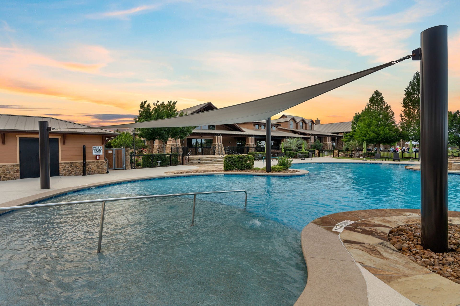 2938 Cone Flower Drive, Richmond, TX 77469 Soak up the sunshine at the Lakehouse's beautiful outdoor pool! Perfect for a refreshing dip, lounging poolside & enjoying the Del Webb lifestyle!