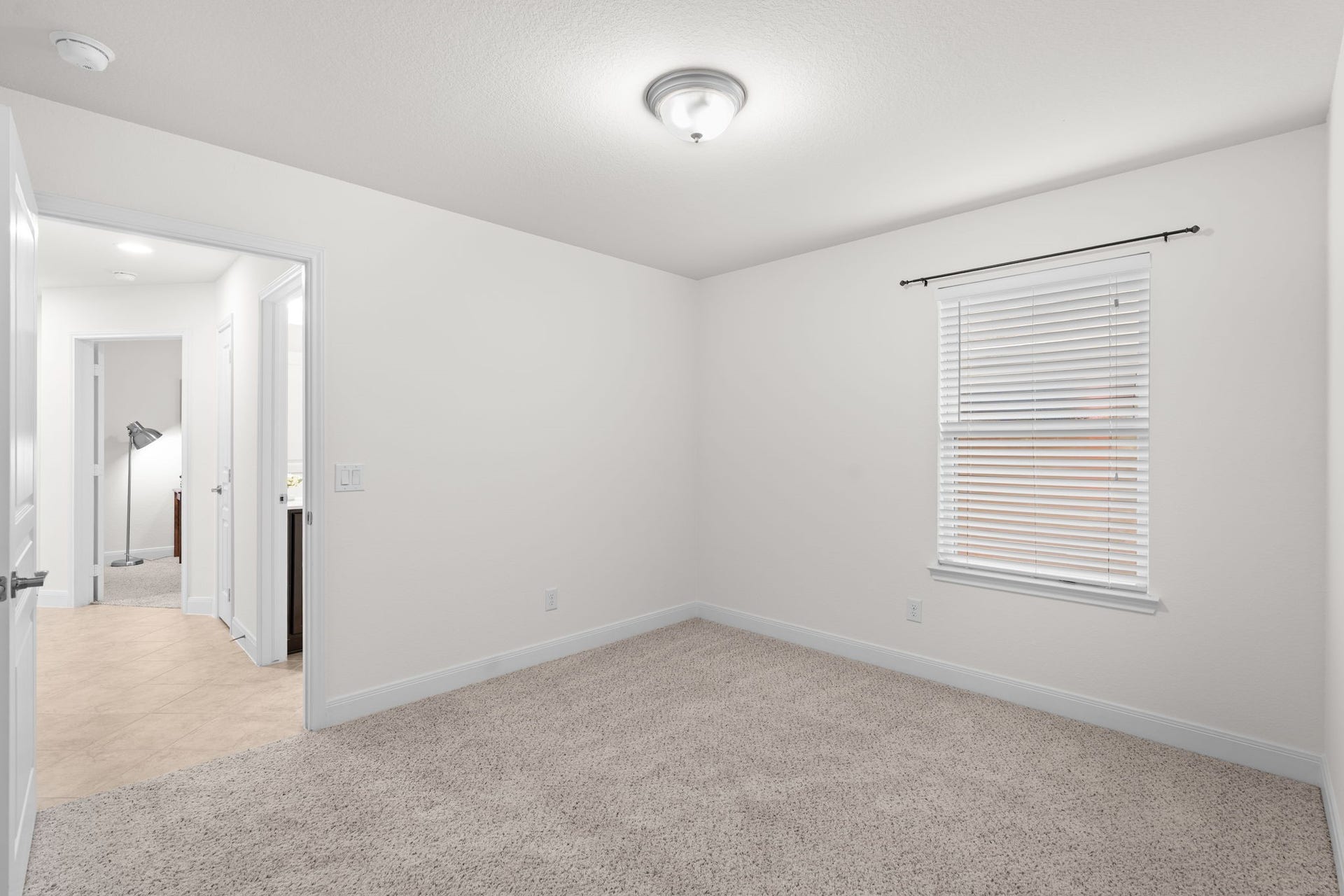2938 Cone Flower Drive, Richmond, TX 77469 Welcoming secondary BR offers comfortable accommodations for overnight guests!