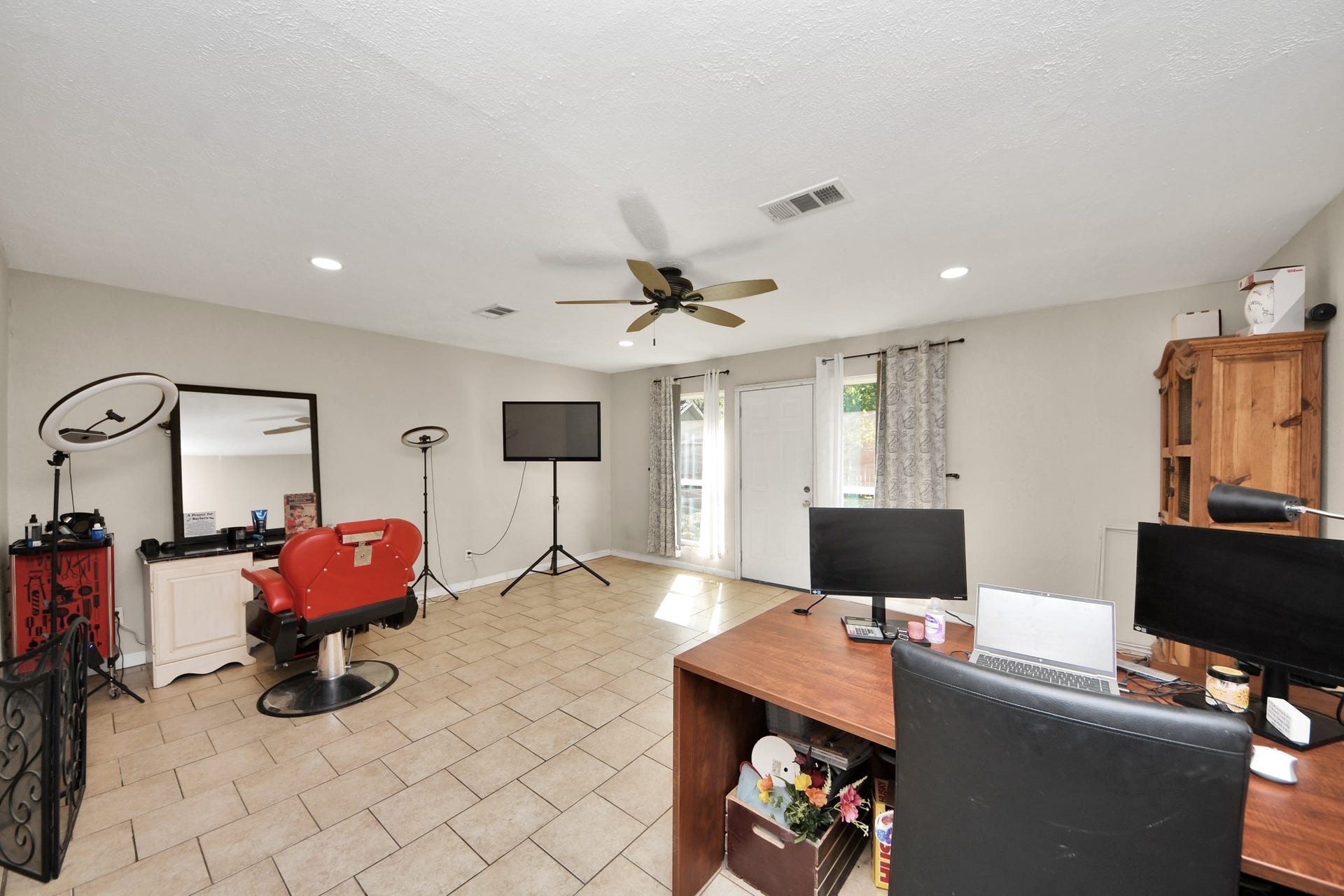 Expansive bonus room offering endless possibilities! Currently used as a home office and flex space, this versatile area features tile flooring, recessed lighting, a ceiling fan, and plenty of natural light. Easily transform it into a second living area, game room, media room, or entertainment space to fit your lifestyle!