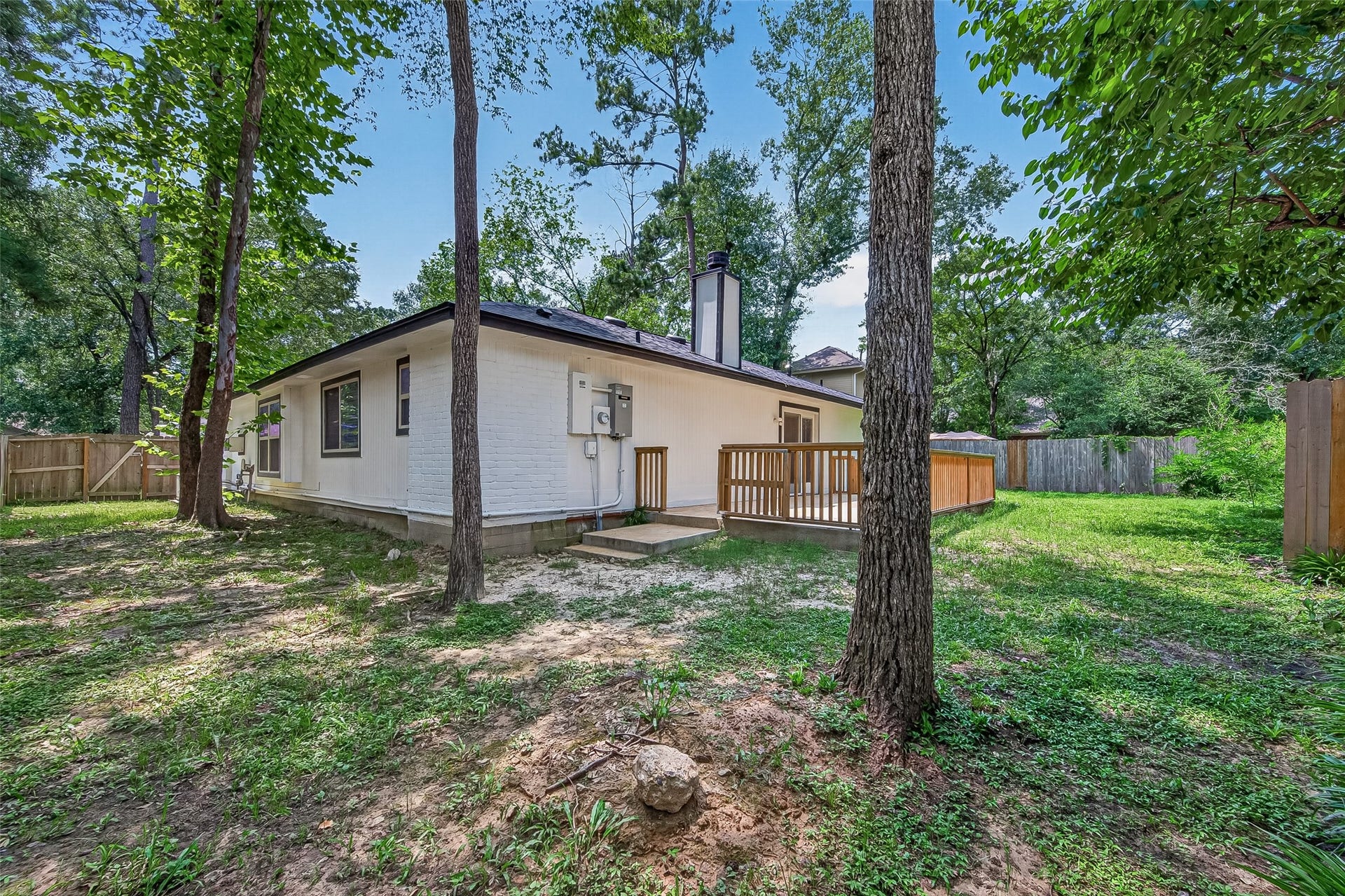 8 N Brook Pebble Court, The Woodlands, TX 77380