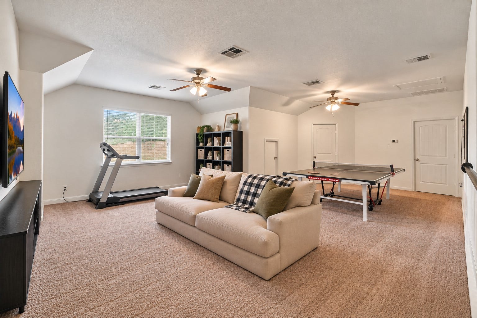 134 Meadow Landing Drive, Conroe, TX 77384 Current owners use it for working out, video games, and play ping pong.