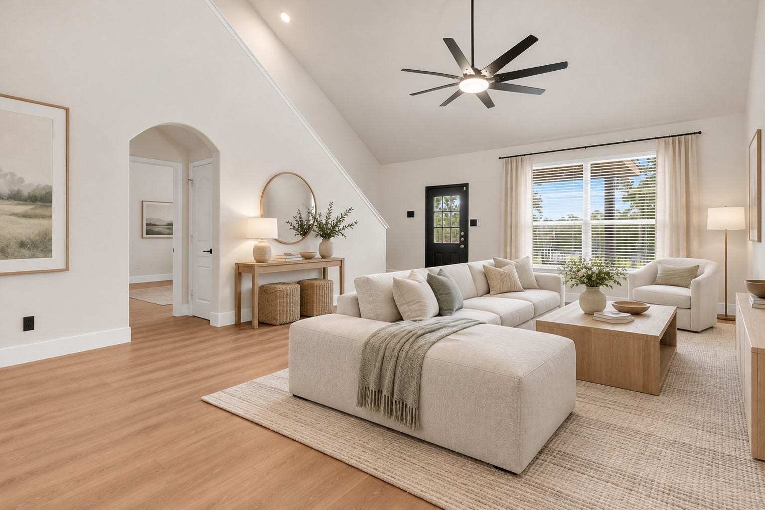 78 Heritage Mill, The Woodlands, TX 77375 Spacious, beautifully updated living area featuring soaring ceilings, gorgeous new wood flooring, and an open-concept design ideal for relaxing or entertaining.