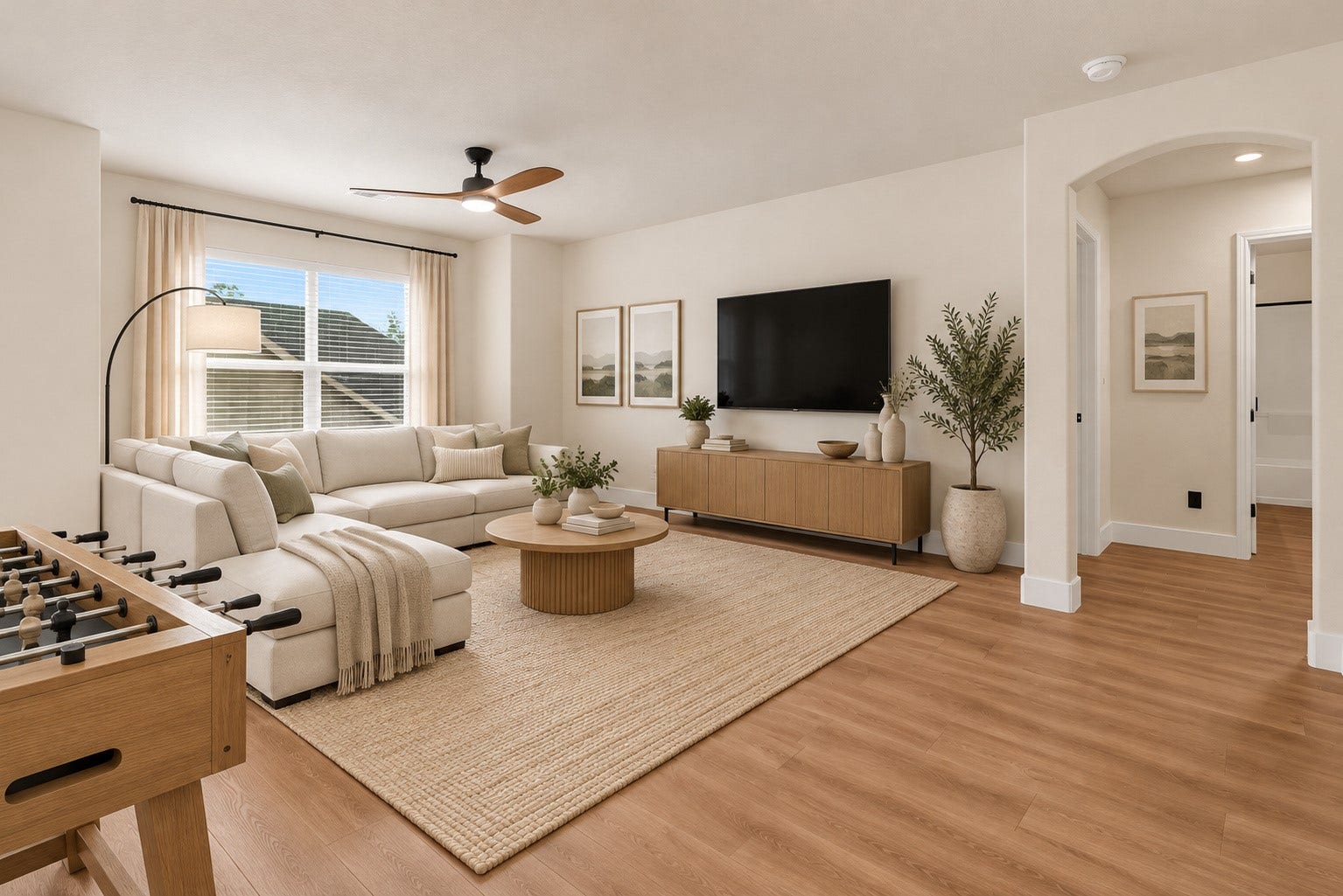 78 Heritage Mill, The Woodlands, TX 77375 Spacious upstairs game room featuring beautiful wood flooring, abundant natural light, and plenty of room for entertaining, movie nights, or family gatherings.