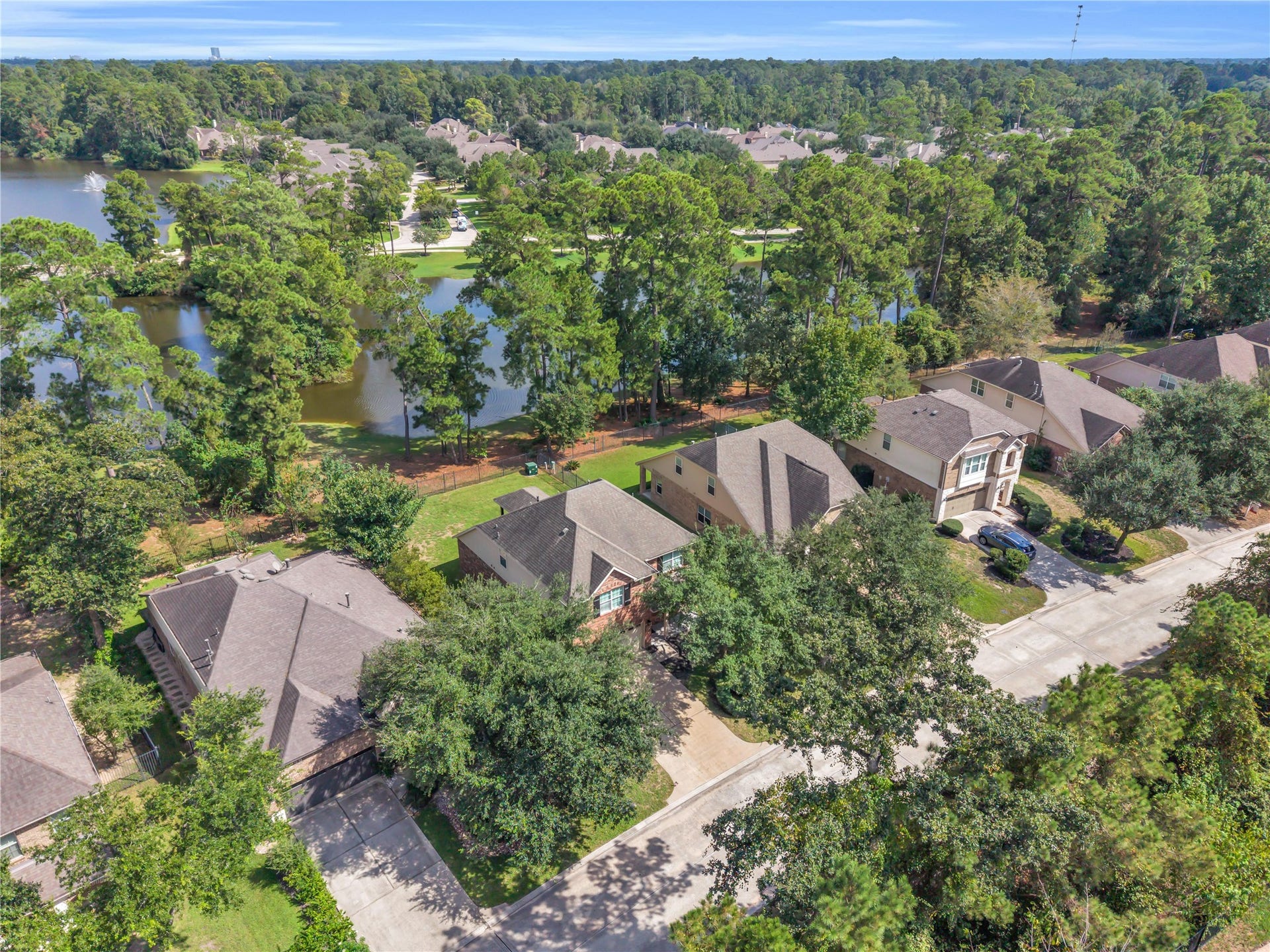 78 Heritage Mill, The Woodlands, TX 77375 Premium waterfront lot offering tranquil lake views, surrounded by majestic trees and the lush natural beauty of The Woodlands, creating a picturesque and private setting.