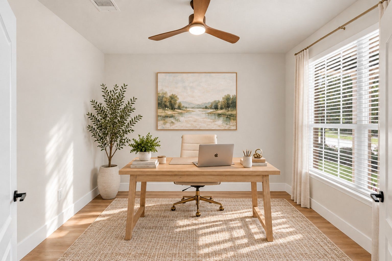 78 Heritage Mill, The Woodlands, TX 77375 A beautiful private home office with elegant glass French doors, abundant natural light, and warm wood flooring offers a bright, peaceful space to work from home.
