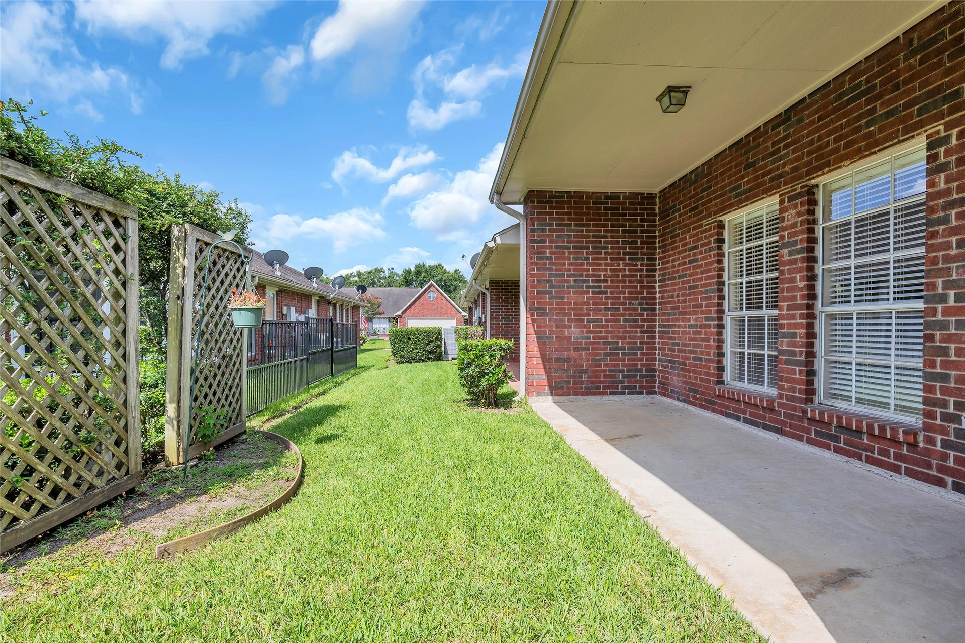 3310 Country Meadows Court, Pearland, TX 77584 The property also includes a covered back patio and a low-maintenance backyard, offering a private and manageable outdoor space.