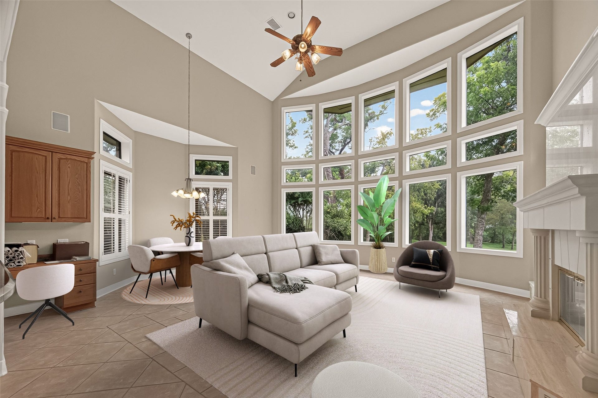 Stunning wall of windows in the Family Room. Virtually Staged.